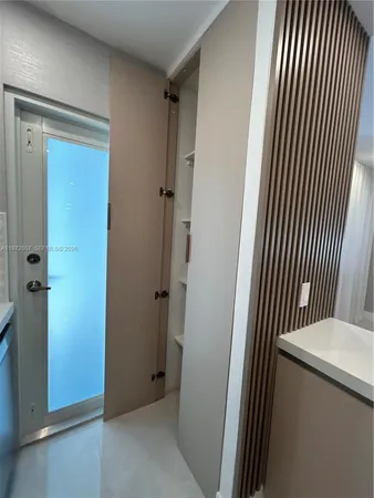 a refrigerator freezer sitting inside of a kitchen