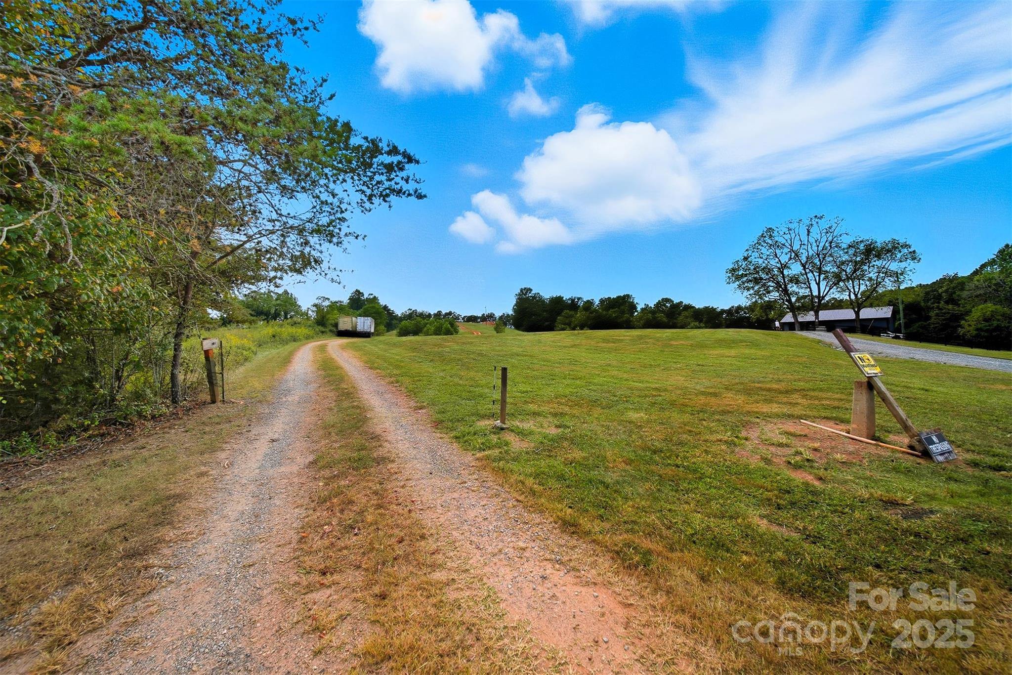 1 Myers Road Granite Falls, NC 28630 - Photo 3 of 13 a view of a lake with a big yard