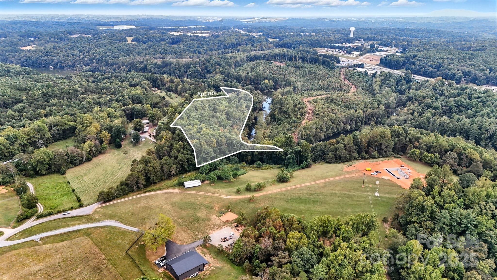 1 Myers Road Granite Falls, NC 28630 - Photo 9 of 13 an aerial view of residential houses with outdoor space and trees