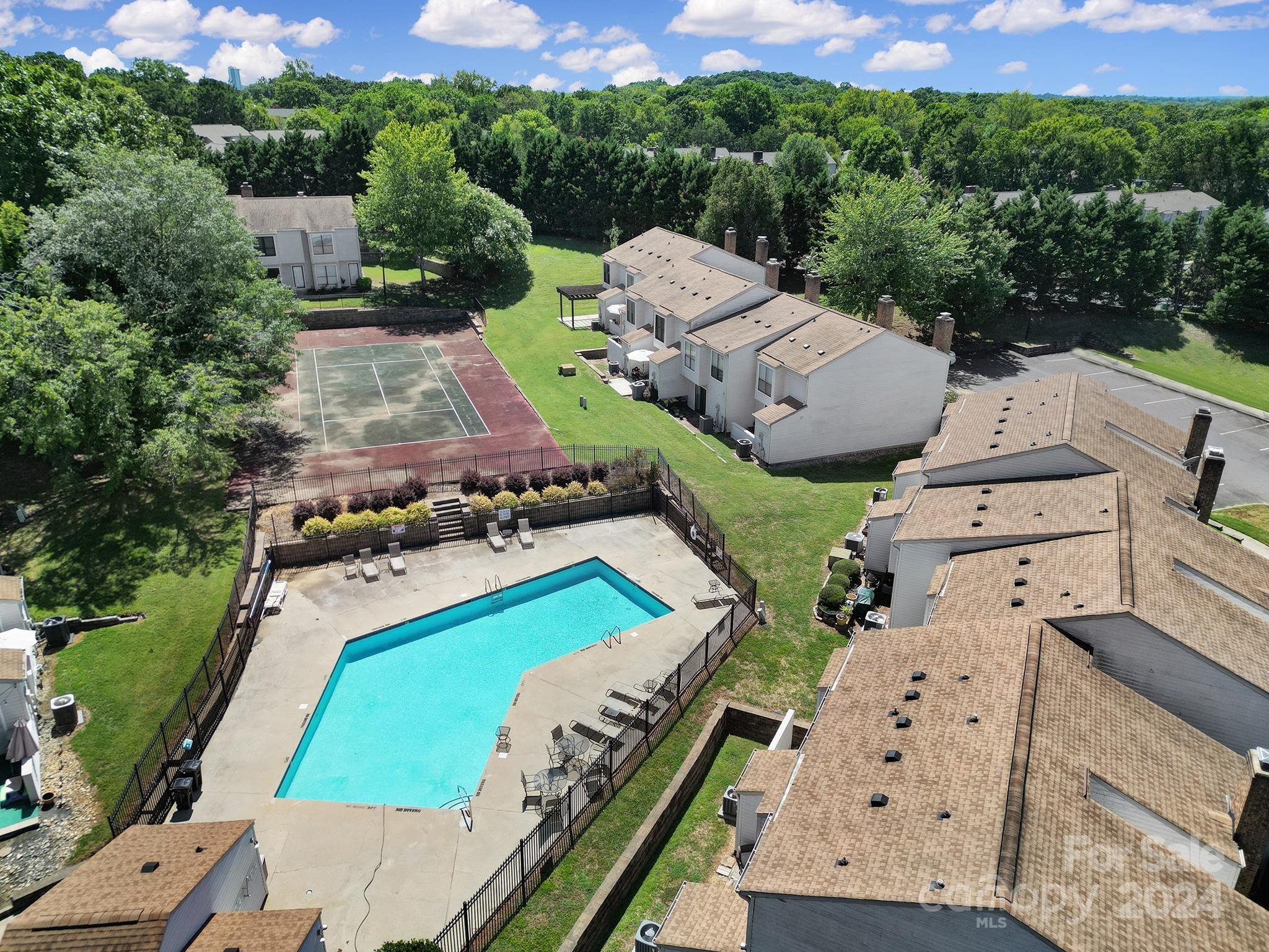 10943 Carmel Crossing Road Charlotte, NC 28226 - Photo 25 of 28 an aerial view of a house with a yard