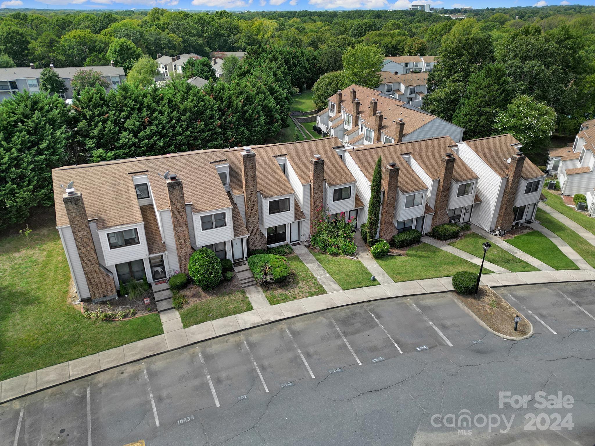 10943 Carmel Crossing Road Charlotte, NC 28226 - Photo 26 of 28 an aerial view of a house with a yard