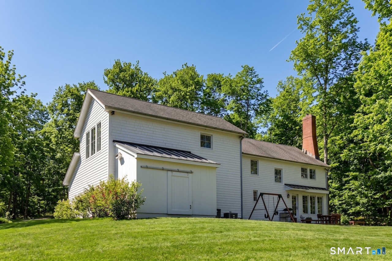 9 Old Paddock Lane Kent, CT 06785 - Photo 26 of 28 front view of a house with a yard
