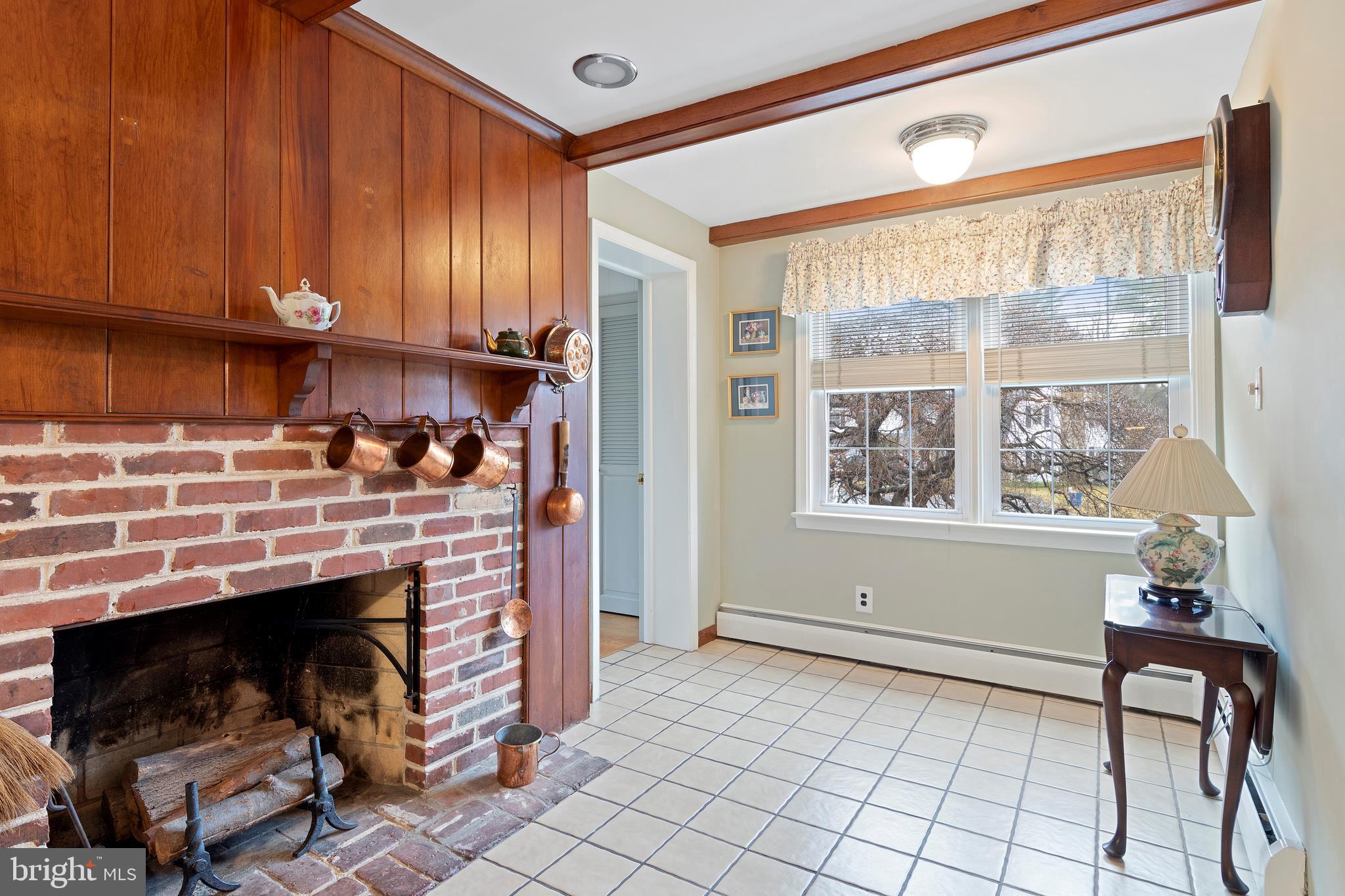 1831 Kimberwick Road Media, PA 19063 - Photo 17 of 36 Kitchen Fireplace with cozy Breakfast Nook.