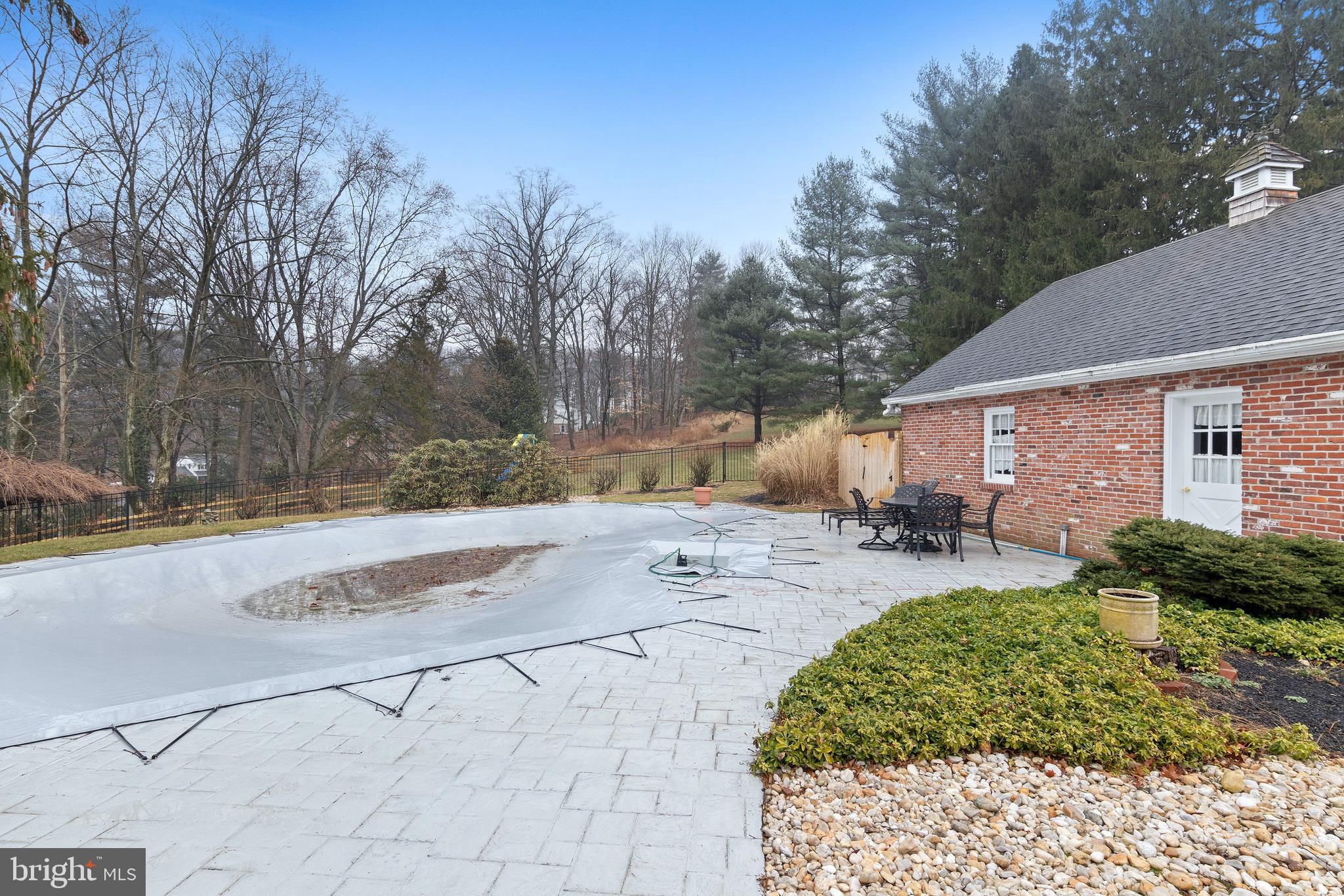 1831 Kimberwick Road Media, PA 19063 - Photo 35 of 36 Pool area has attractive black iron fencing.