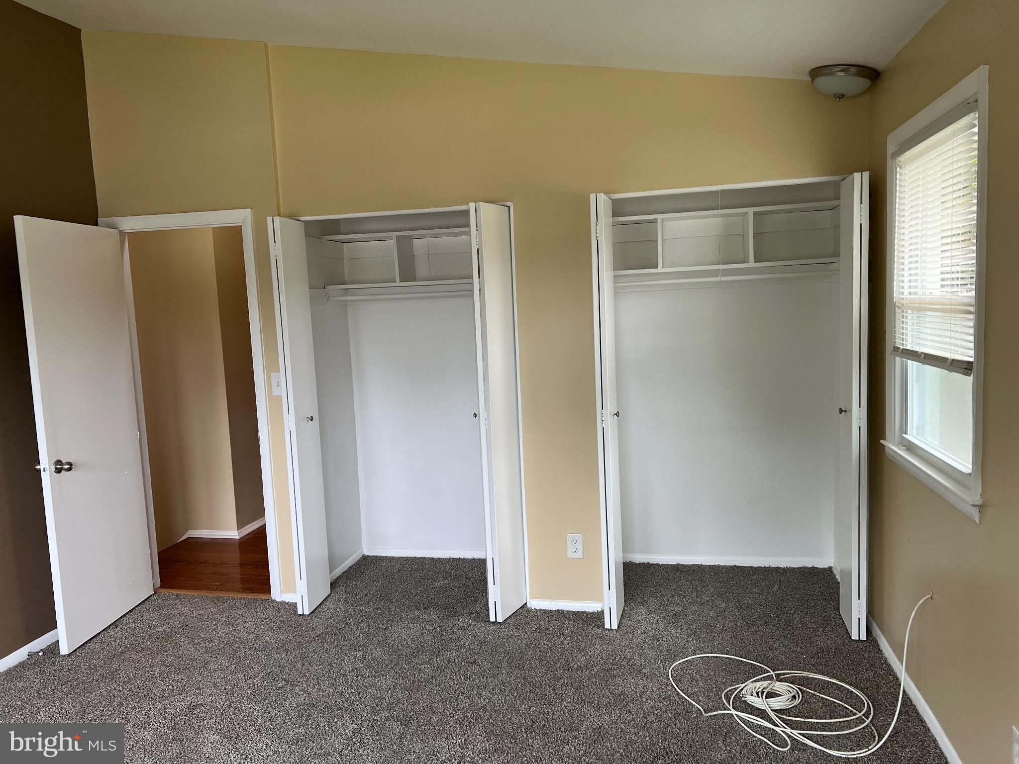 8503 Stevenswood Road Windsor Mill, MD 21244 - Photo 14 of 18 an empty room with windows and closet