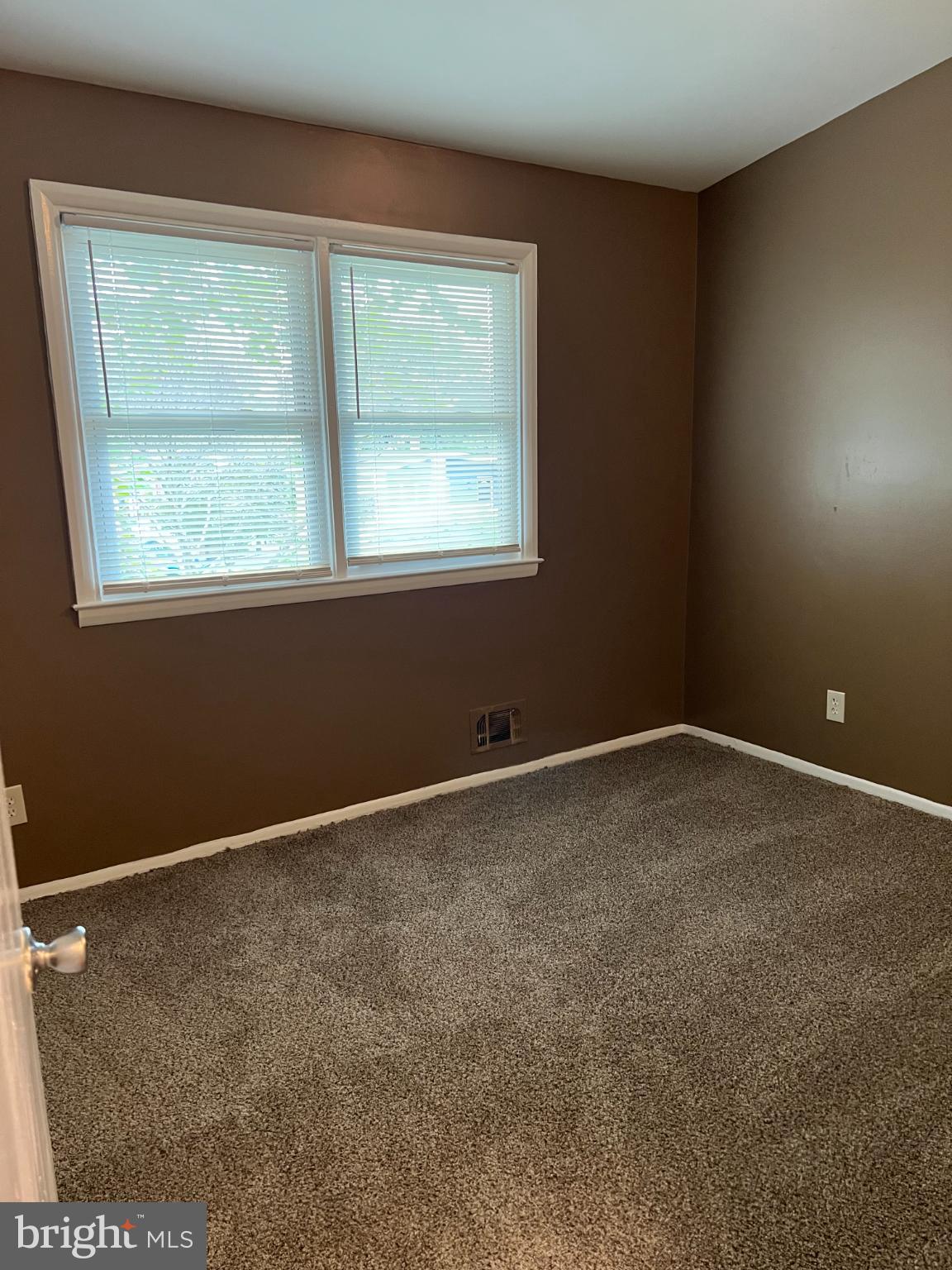 8503 Stevenswood Road Windsor Mill, MD 21244 - Photo 16 of 18 an empty room with a window