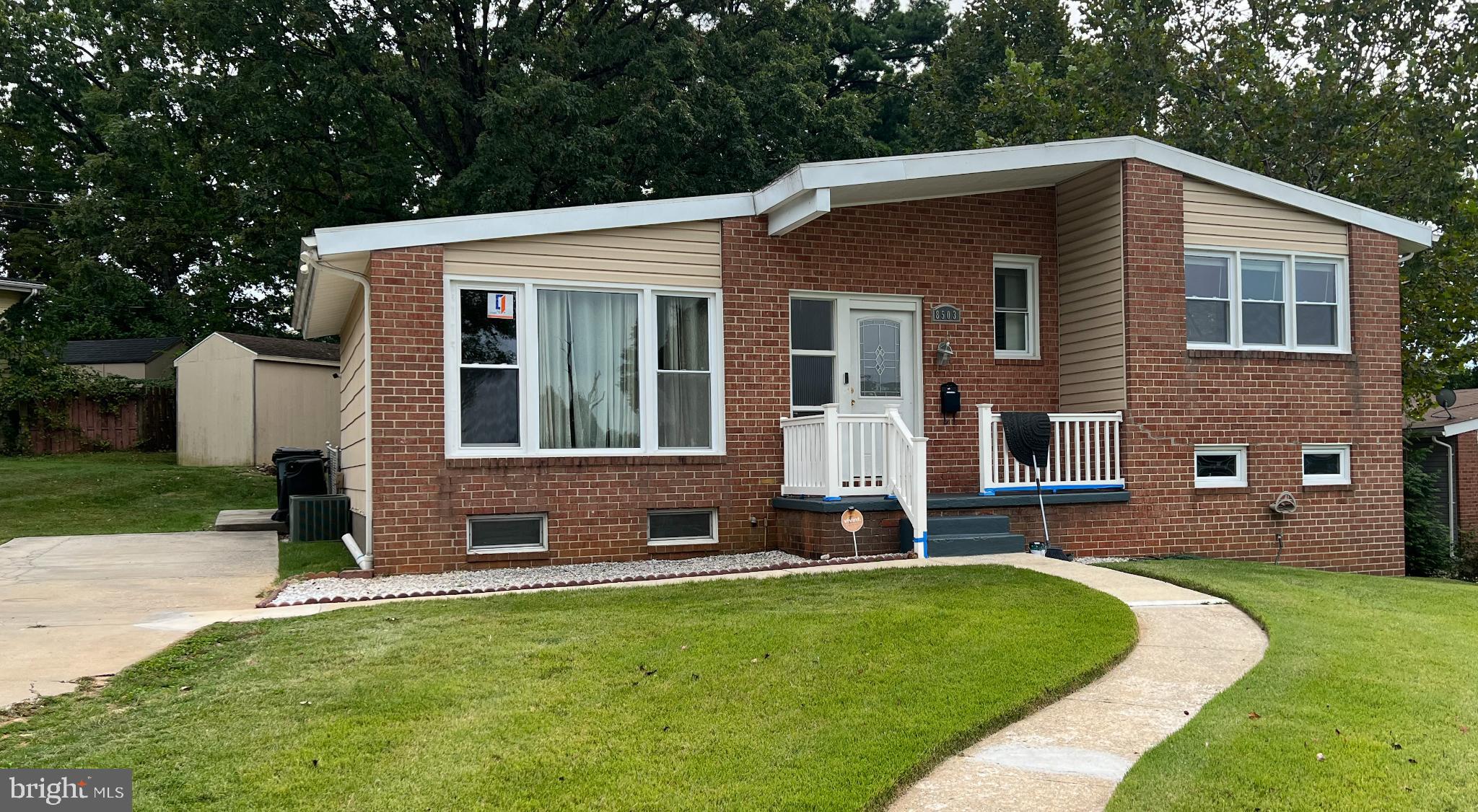 8503 Stevenswood Road Windsor Mill, MD 21244 - Photo 2 of 18 a view of a house with a yard