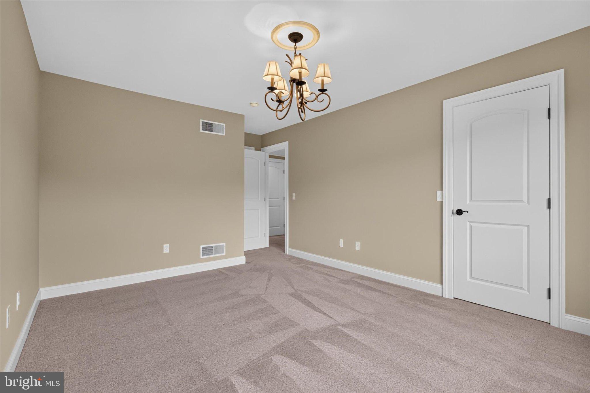 6505 Plowman Ridge Harrisburg, PA 17112 - Photo 44 of 83 Elegant room with soft lighting charm.