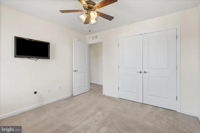 a view of a livingroom with a flat screen tv