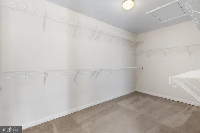 a view of a room with racks on the wall