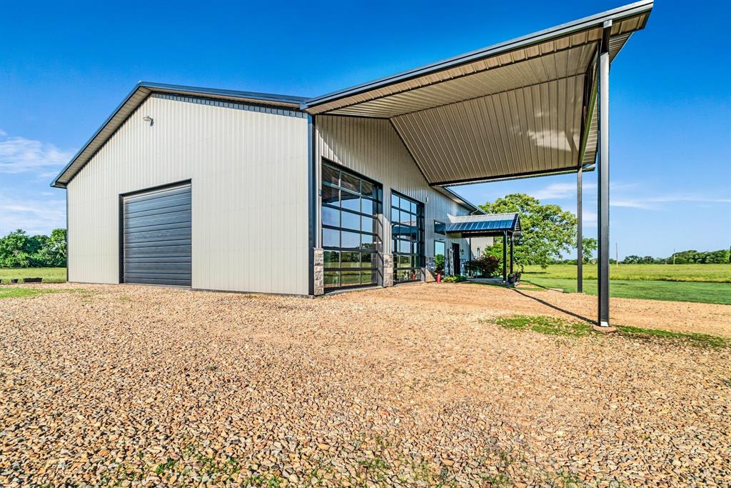 962 County Road Pattonville, TX 75468 - Photo 2 of 37 a house view with a backyard space