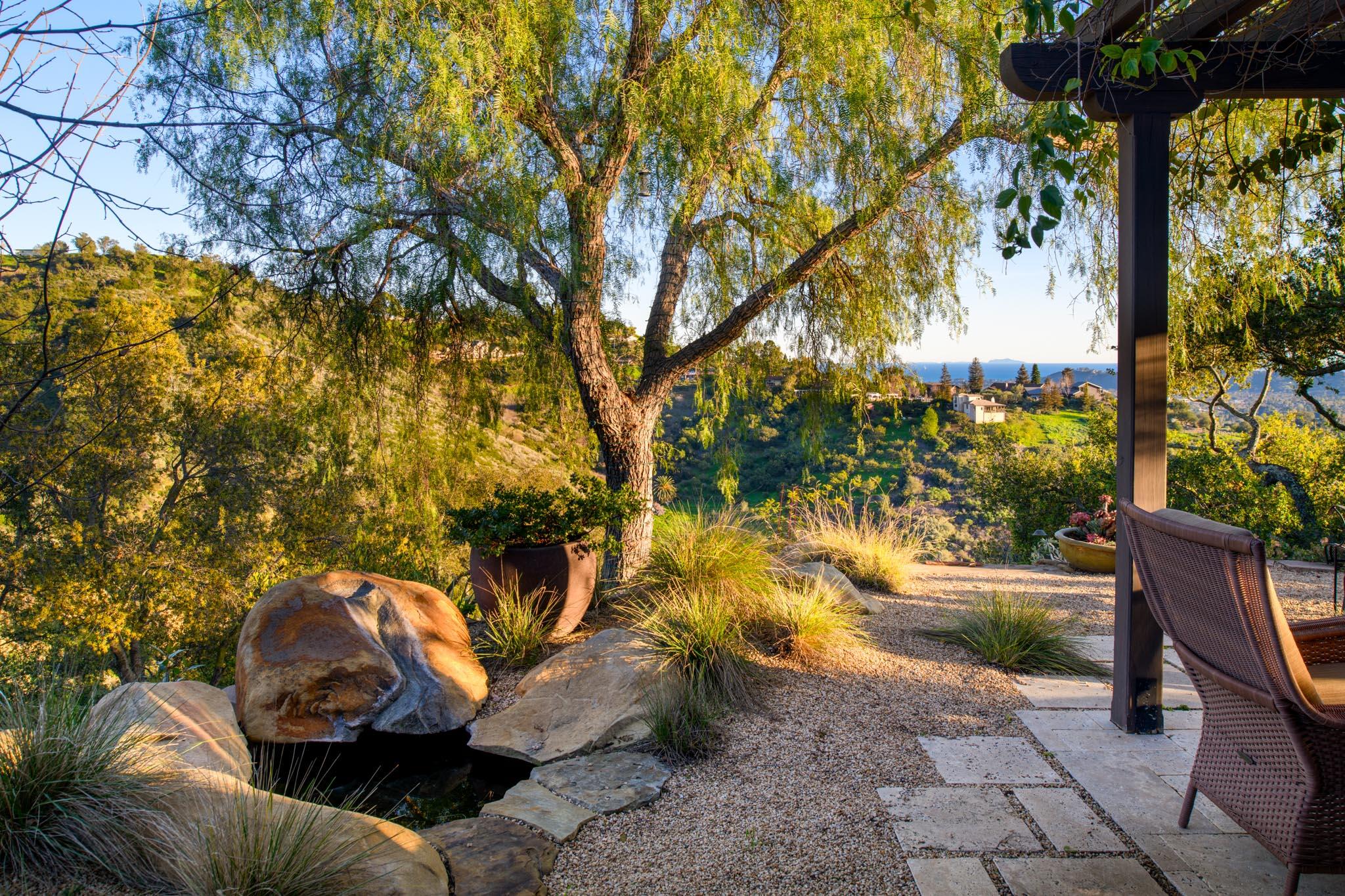 1250 Northridge Road Santa Barbara, CA 93105 - Photo 25 of 37 a view of a yard with furniture and a fire pit
