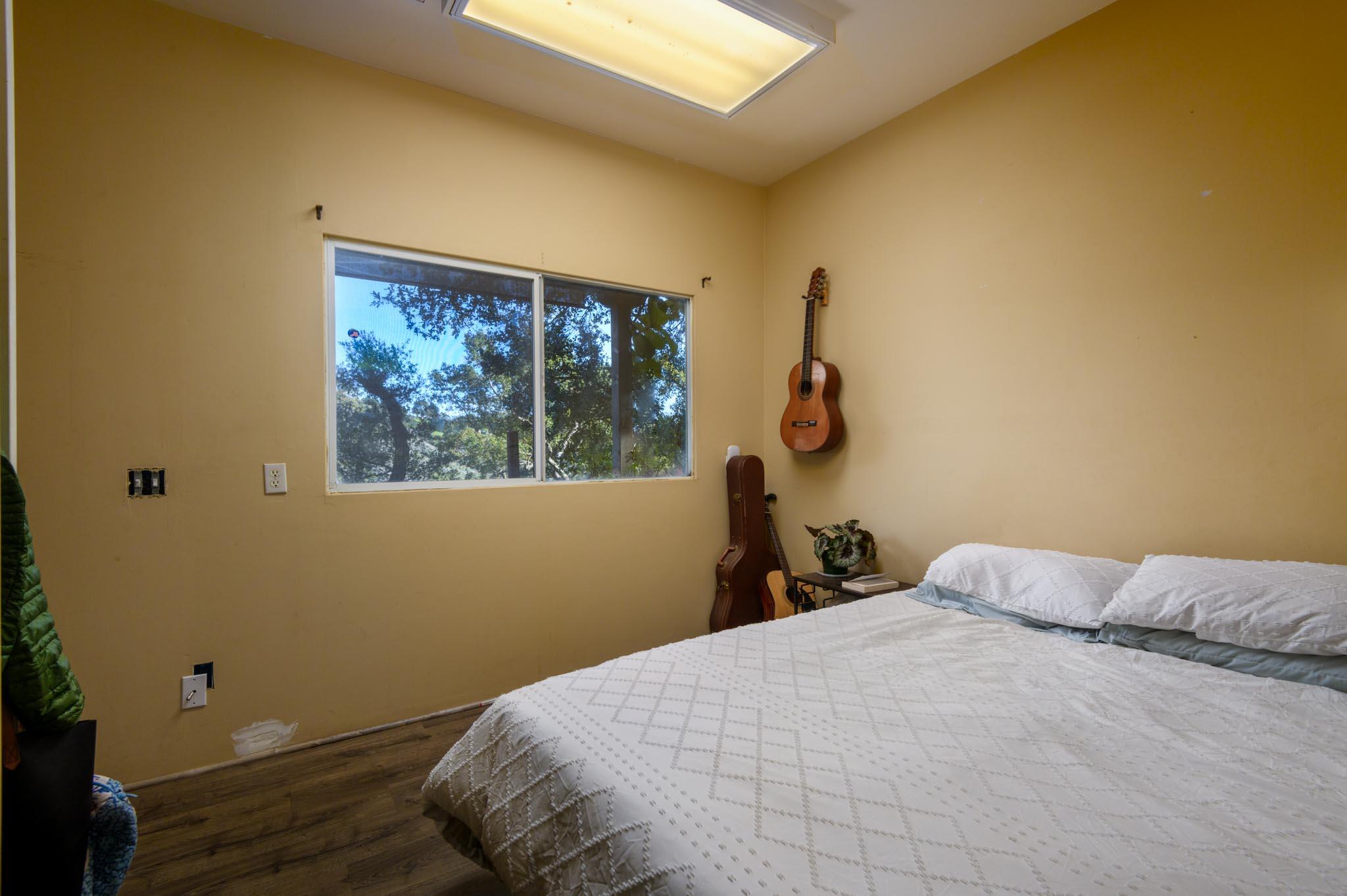 1250 Northridge Road Santa Barbara, CA 93105 - Photo 31 of 37 a bedroom with a bed and a window