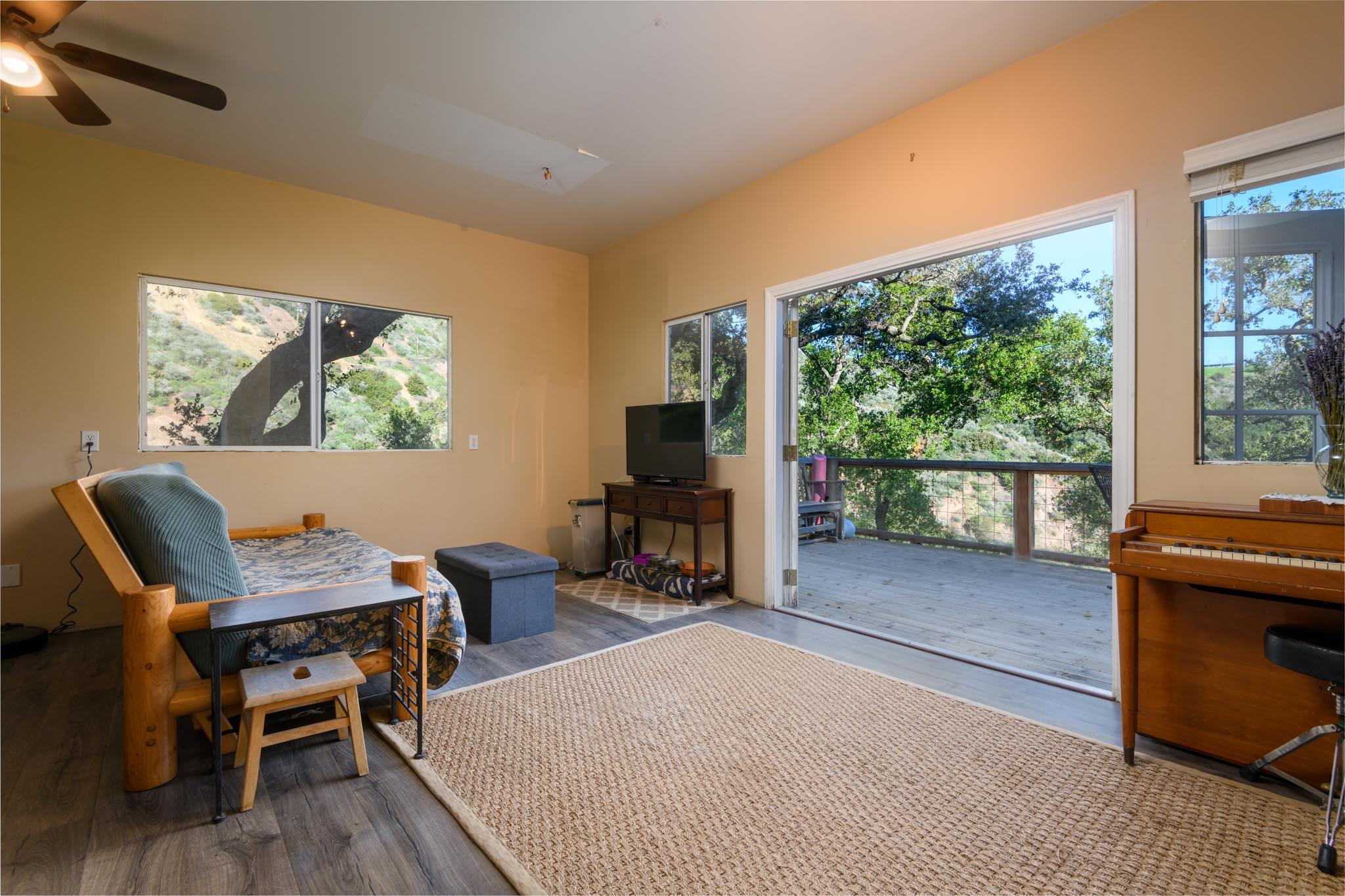 1250 Northridge Road Santa Barbara, CA 93105 - Photo 32 of 37 a living room with furniture and a fireplace