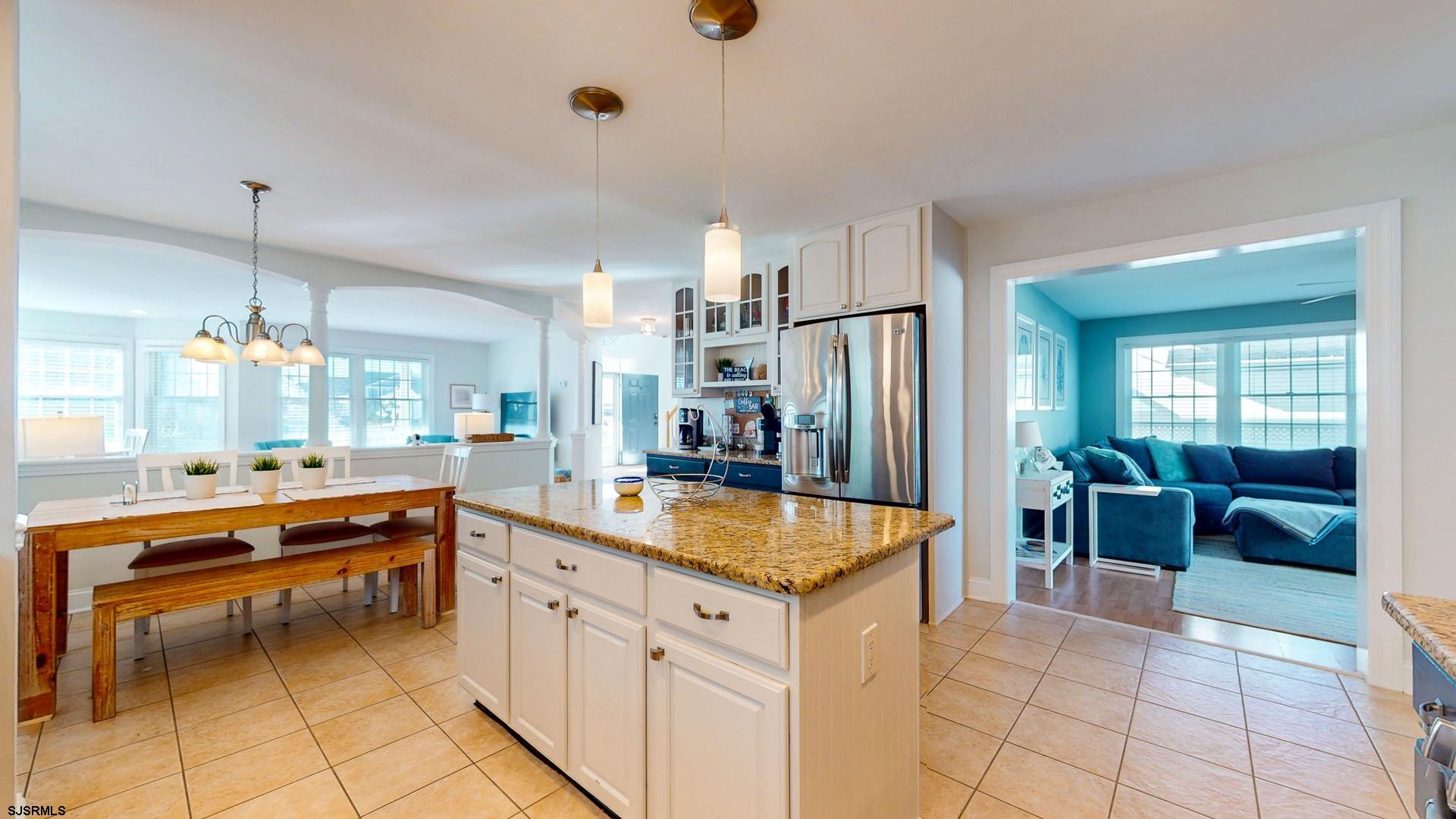 39 Spruce Road Ocean City, NJ 08226 - Photo 17 of 51 a kitchen with stainless steel appliances granite countertop a refrigerator and a sink