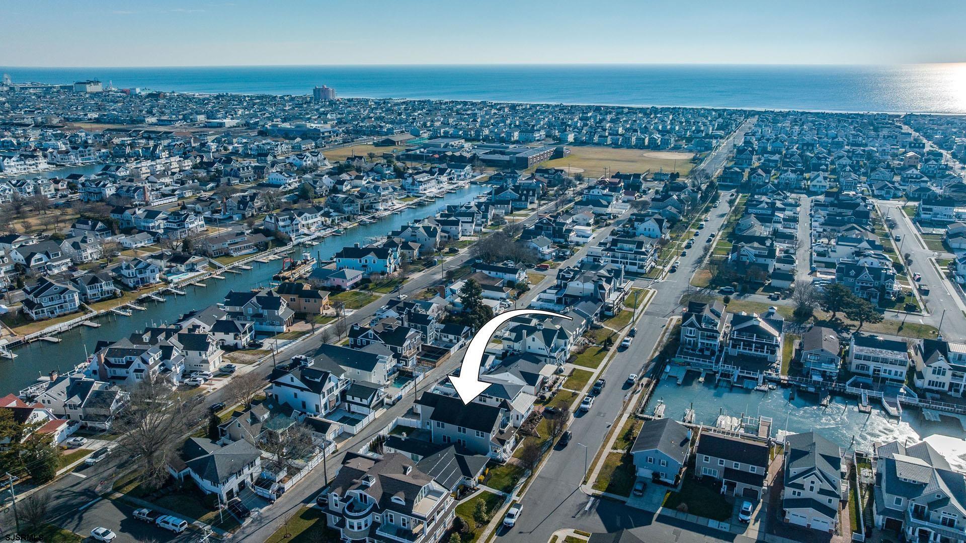 39 Spruce Road Ocean City, NJ 08226 - Photo 48 of 51 an aerial view of a building with parking space