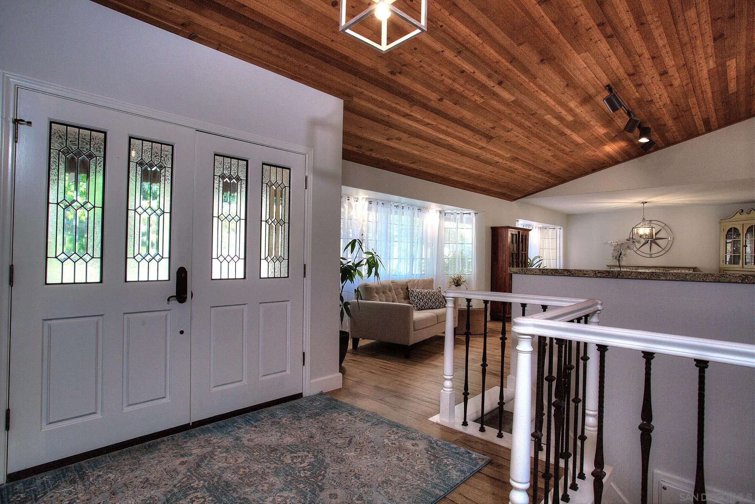 1032 Los Alisos Drive North Fallbrook, CA 92028 - Photo 2 of 44 a view of a livingroom with furniture hardwood floor and a ceiling fan