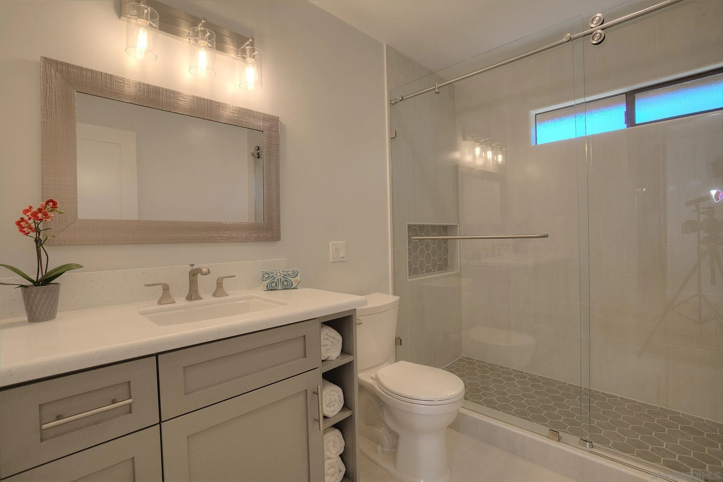 1032 Los Alisos Drive North Fallbrook, CA 92028 - Photo 24 of 44 a bathroom with a sink a toilet and shower