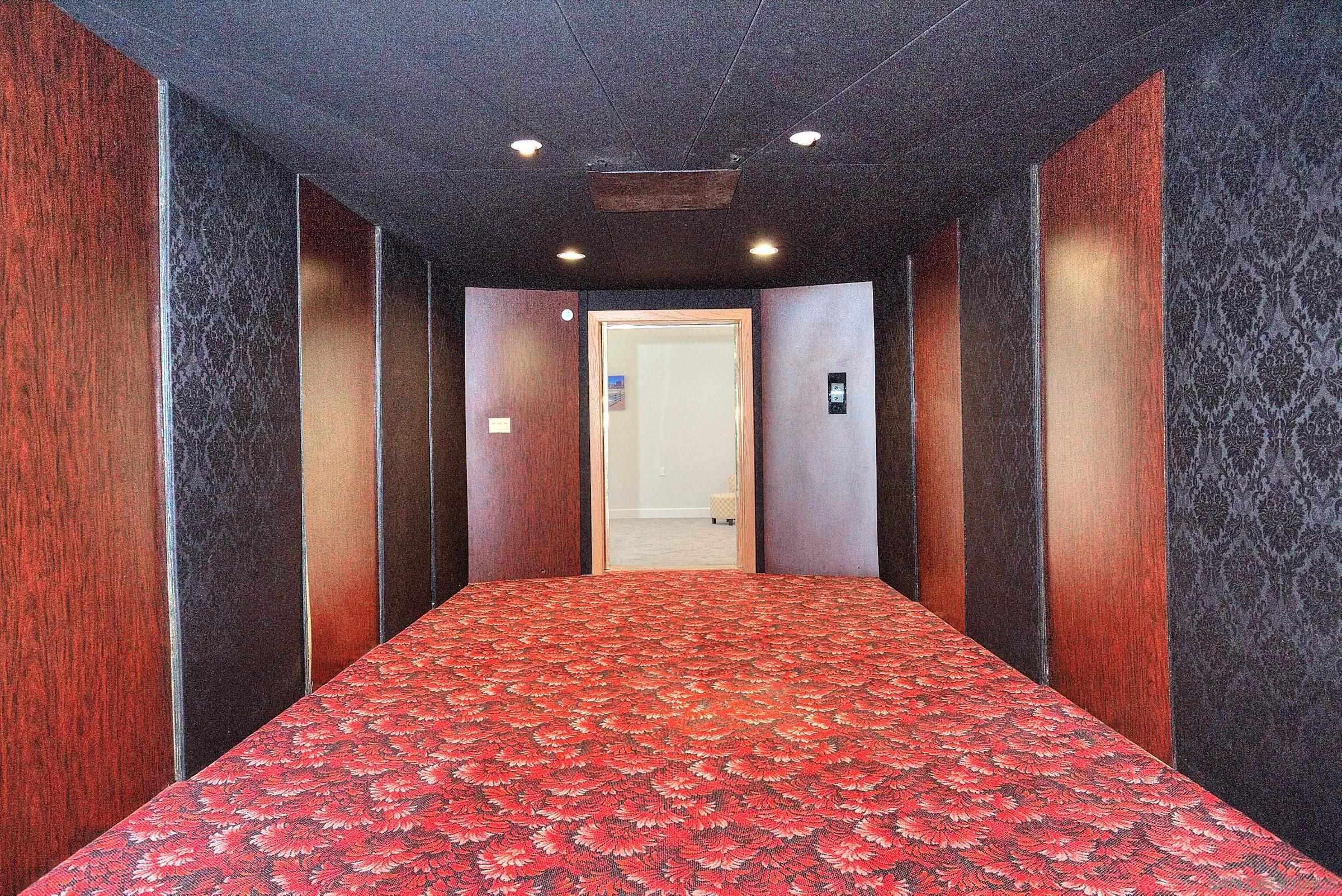 1032 Los Alisos Drive North Fallbrook, CA 92028 - Photo 28 of 44 a view of a big room with a chandelier and closet