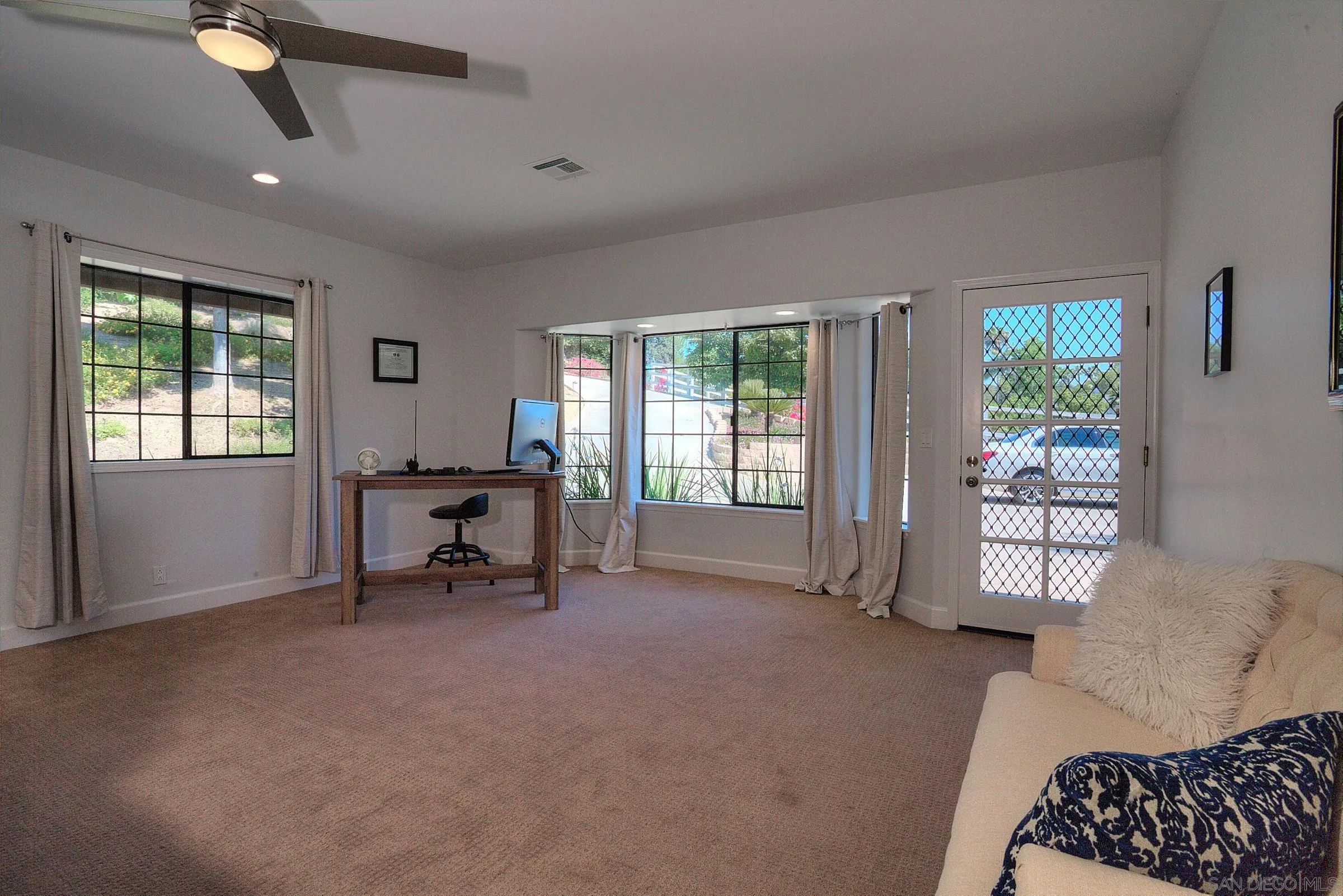 1032 Los Alisos Drive North Fallbrook, CA 92028 - Photo 29 of 44 a living room with furniture and a window