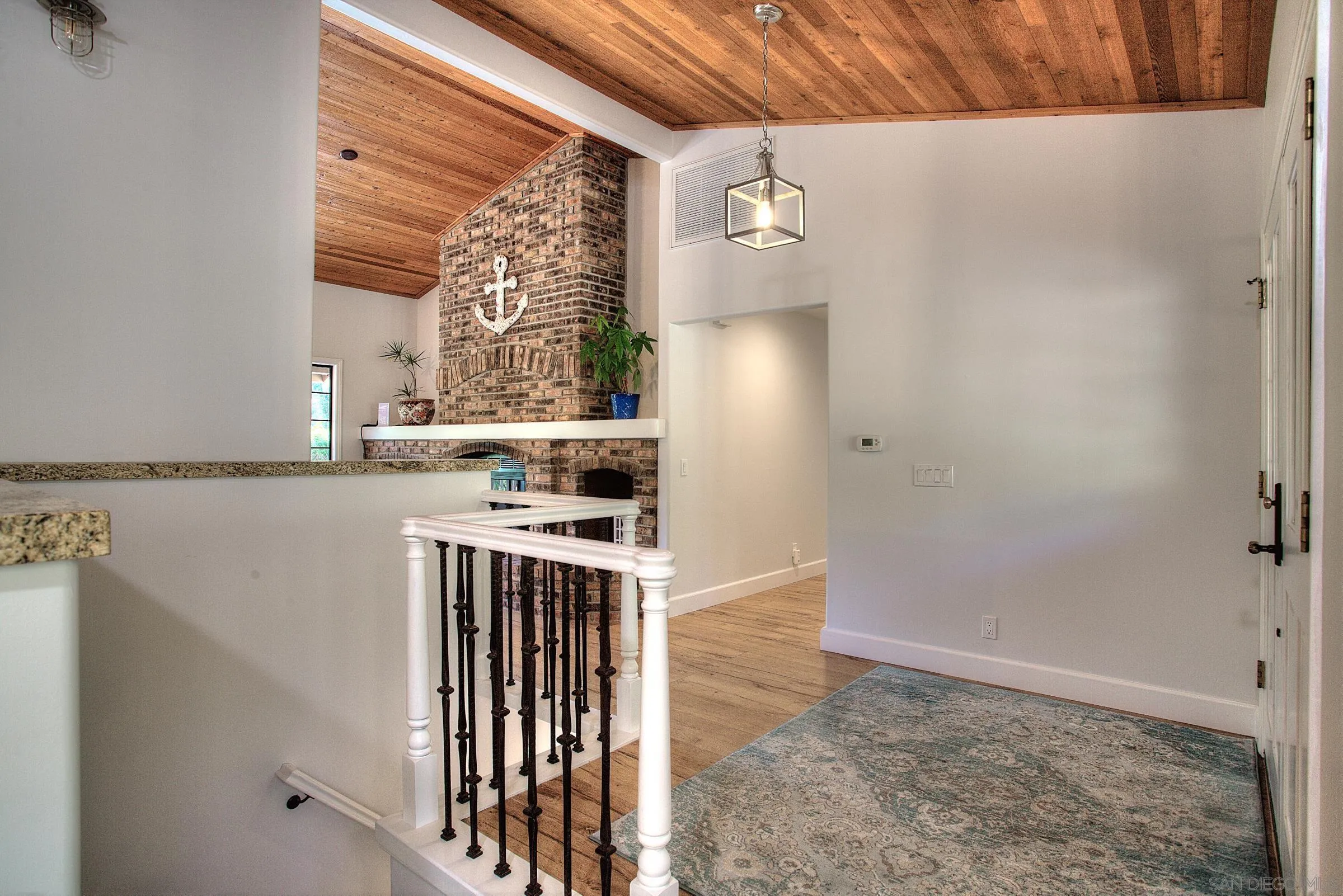 1032 Los Alisos Drive North Fallbrook, CA 92028 - Photo 3 of 44 a kitchen with a stove a refrigerator and a window