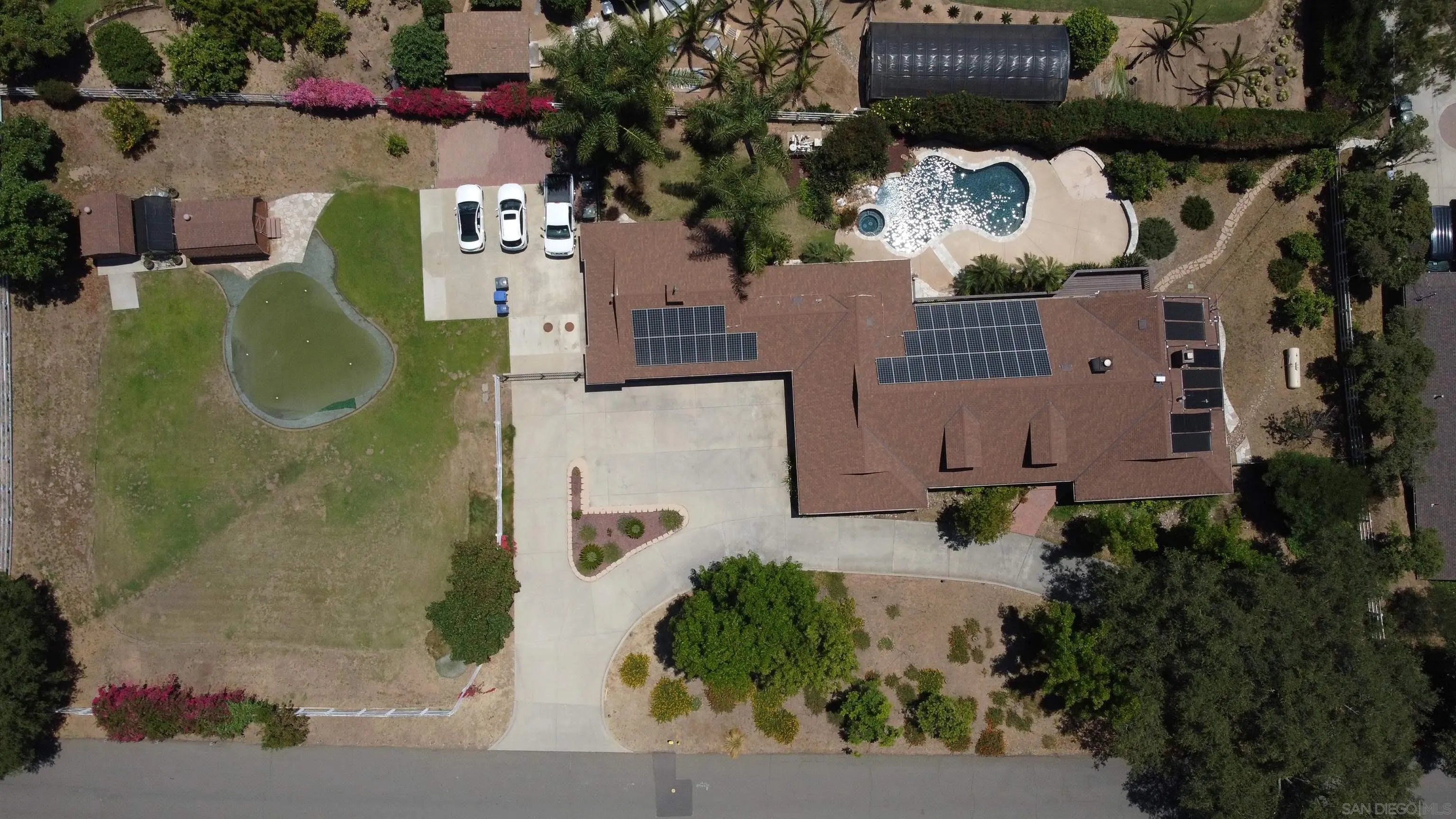 1032 Los Alisos Drive North Fallbrook, CA 92028 - Photo 42 of 44 an aerial view of a house with a yard