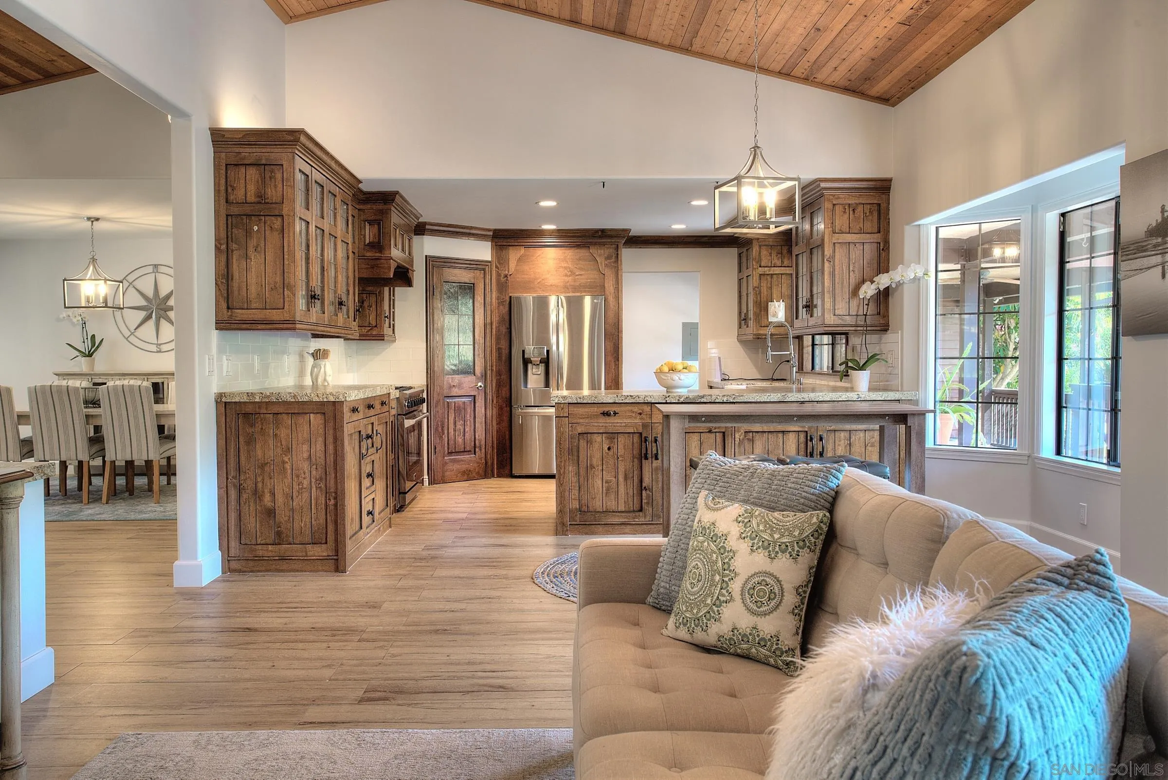 1032 Los Alisos Drive North Fallbrook, CA 92028 - Photo 8 of 44 a living room with furniture and kitchen view
