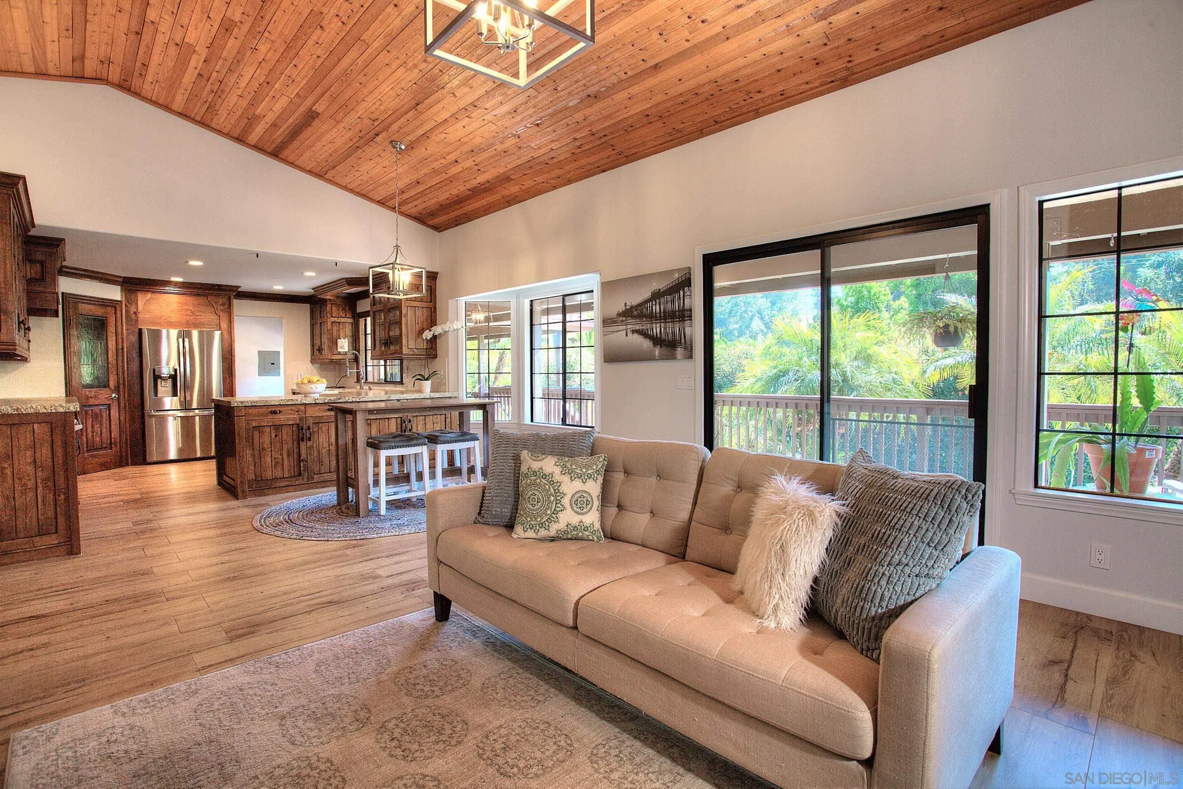1032 Los Alisos Drive North Fallbrook, CA 92028 - Photo 9 of 44 a living room with furniture and a large window