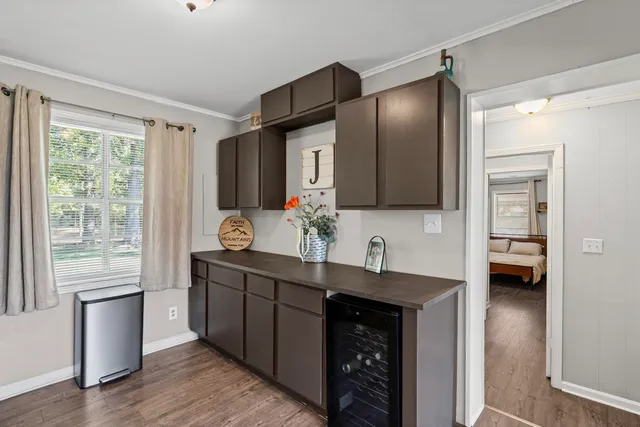 a kitchen with stainless steel appliances a sink stove and refrigerator
