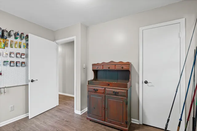 a room with furniture and wooden floor