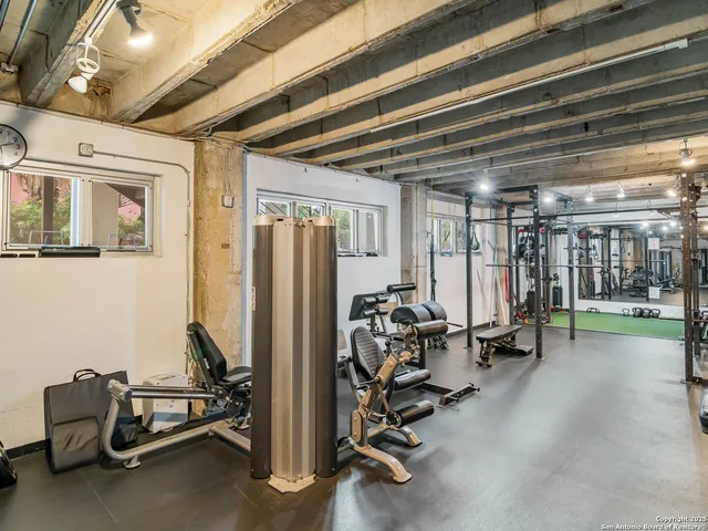 a view of a room with gym equipment