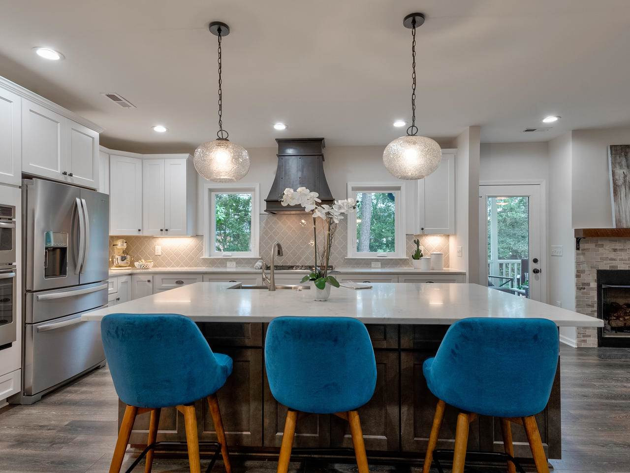 1000 Deerfield Road Raleigh, NC 27609 - Photo 11 of 30 The kitchen island is HUGE! Cabinets on both sides of island offer so much storage. Great for casual dining.