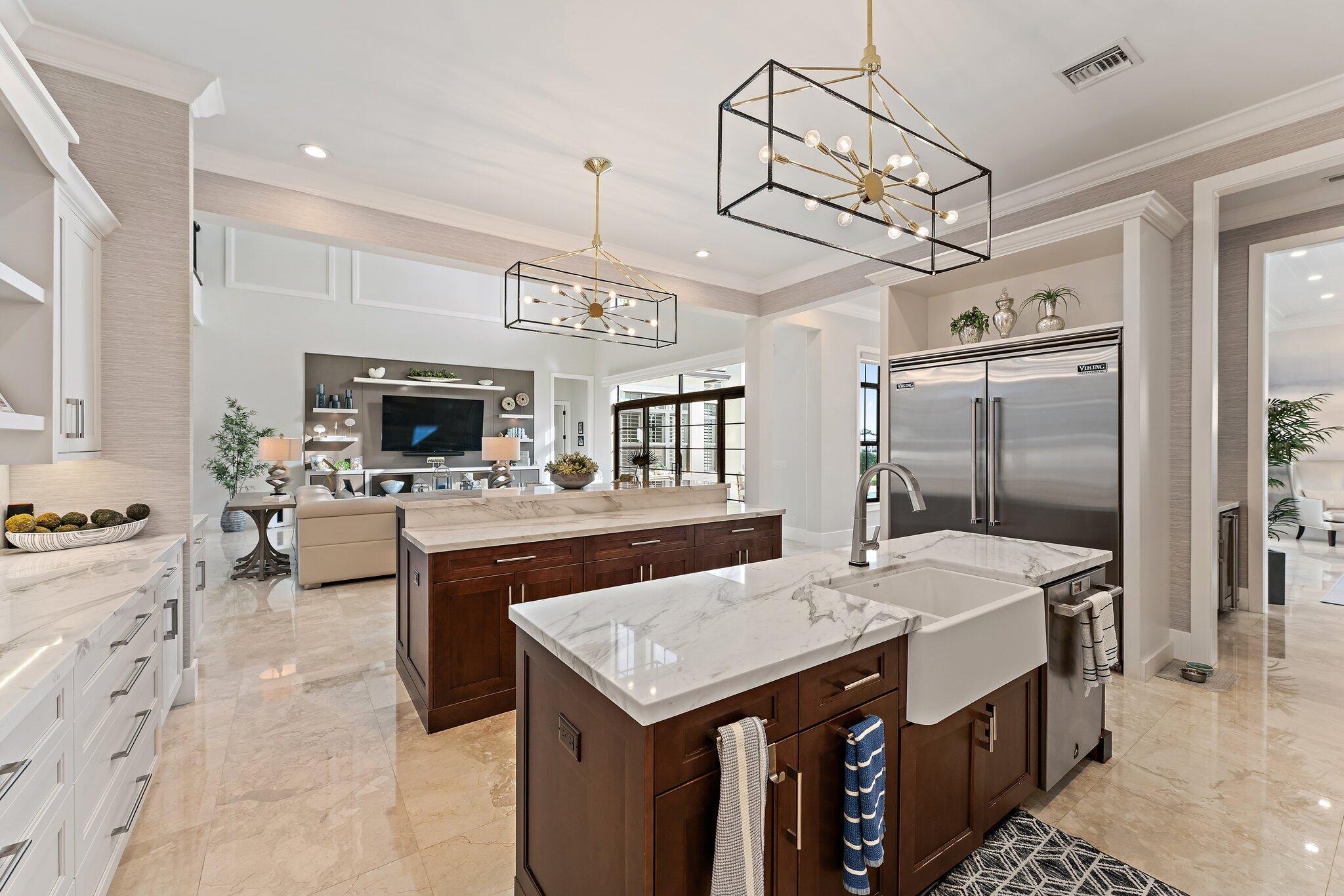 5730 Holly Lane Jupiter, FL 33458 - Photo 19 of 58 a kitchen with stainless steel appliances granite countertop a sink a stove and a refrigerator