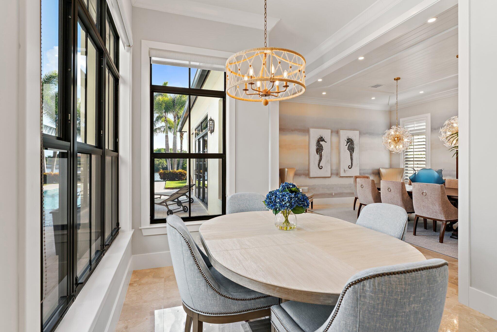 5730 Holly Lane Jupiter, FL 33458 - Photo 25 of 58 a view of a dining room with furniture window and outside view