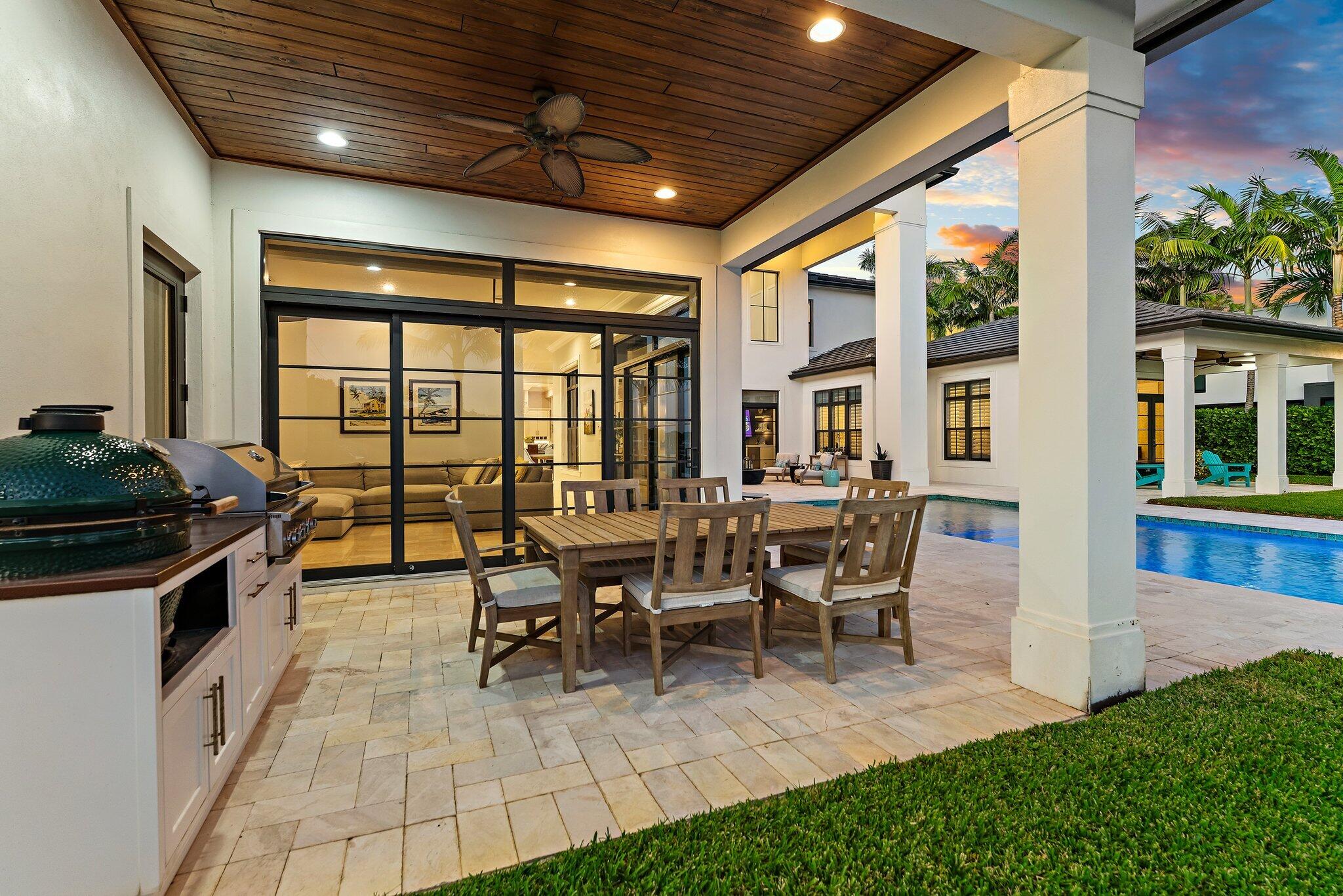 5730 Holly Lane Jupiter, FL 33458 - Photo 30 of 58 a view of a dining room with furniture window and outside view