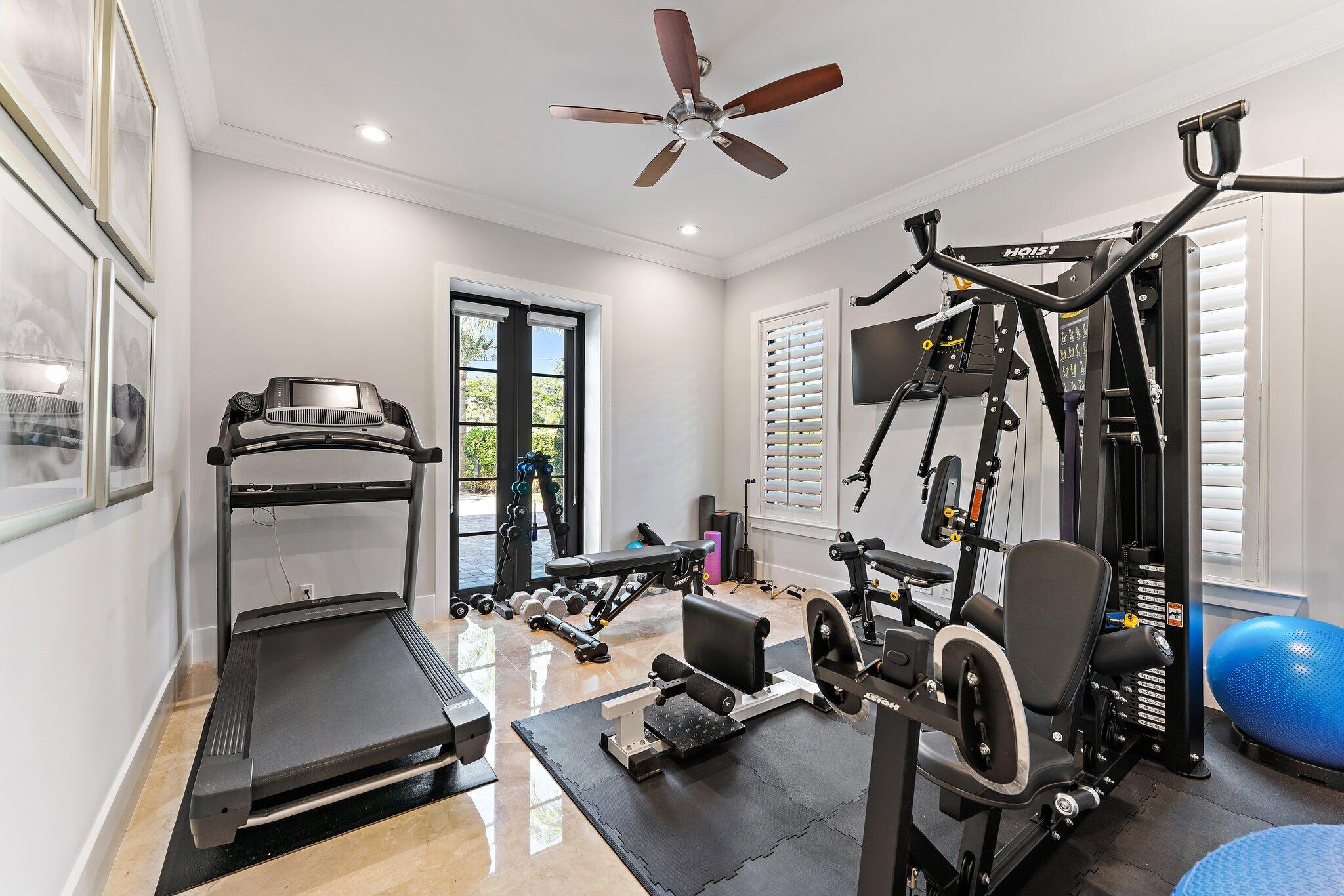 5730 Holly Lane Jupiter, FL 33458 - Photo 32 of 58 a view of a room with gym equipment