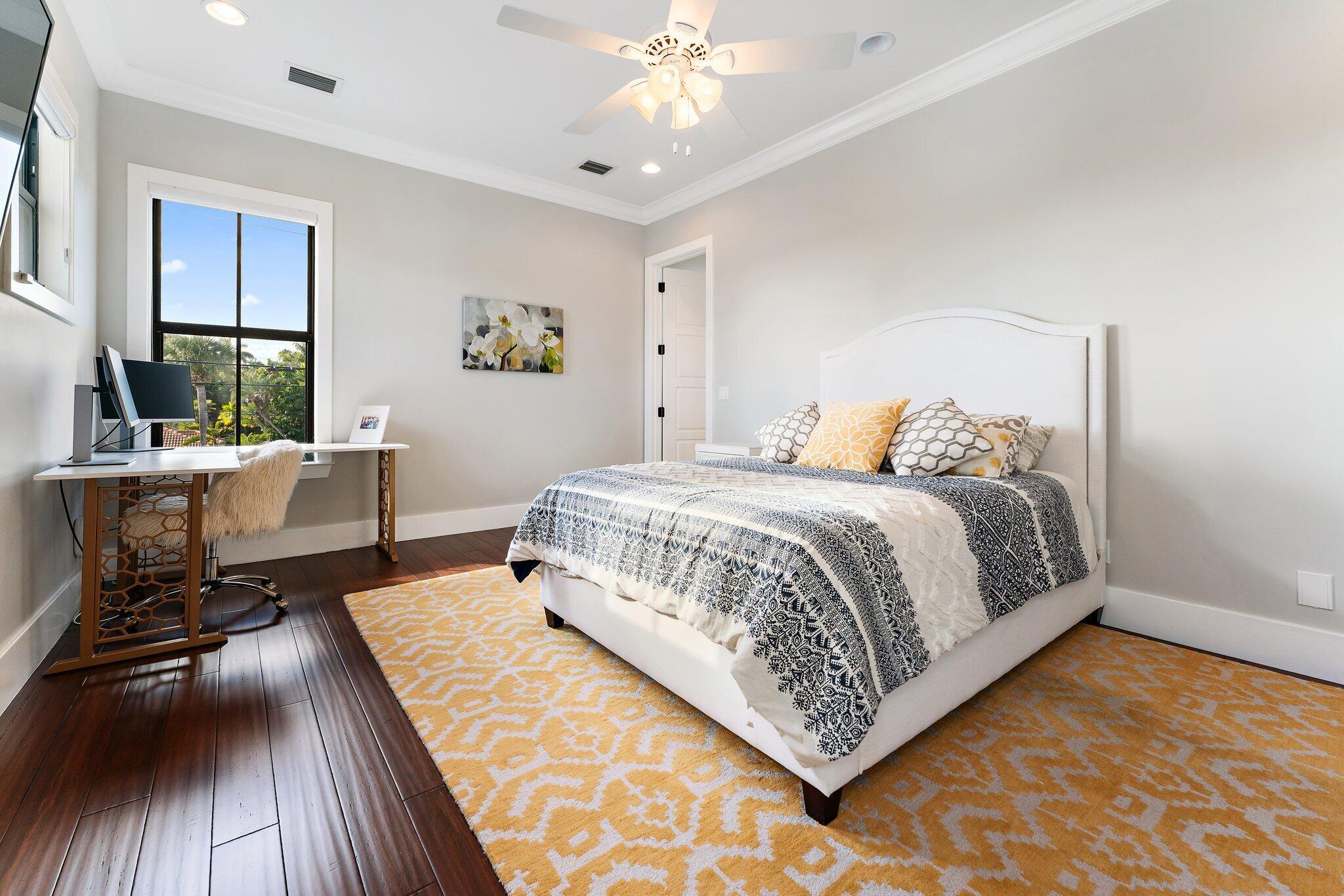 5730 Holly Lane Jupiter, FL 33458 - Photo 42 of 58 a bedroom with bed and window