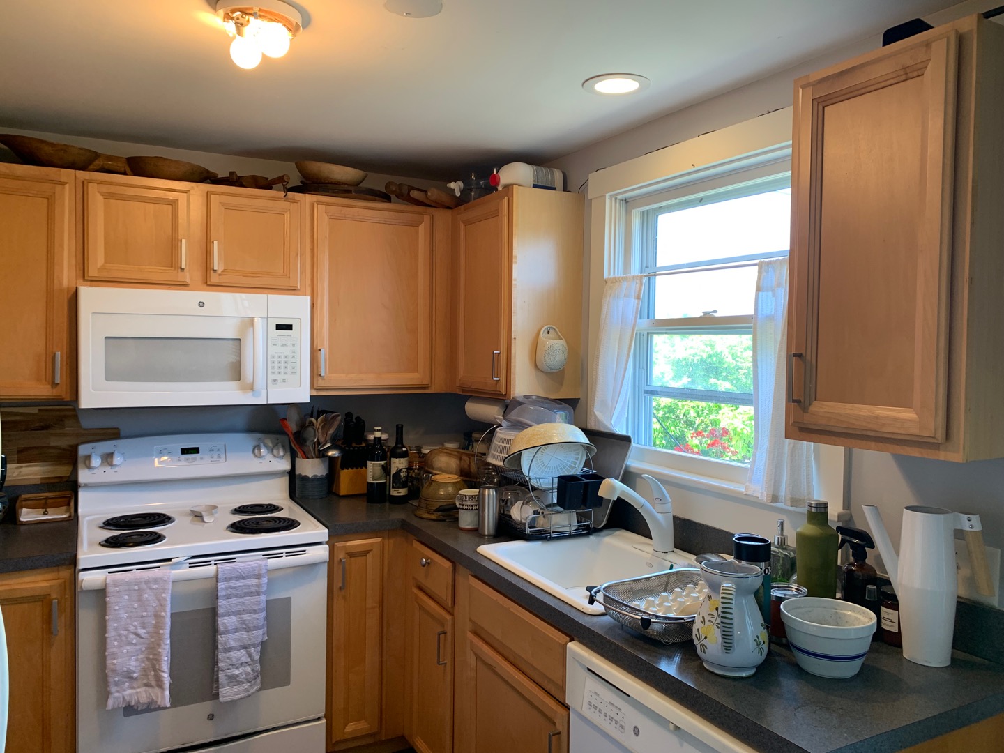 5 Salros Road Nantucket, MA 02554 - Photo 5 of 24 a kitchen with sink a stove and cabinets