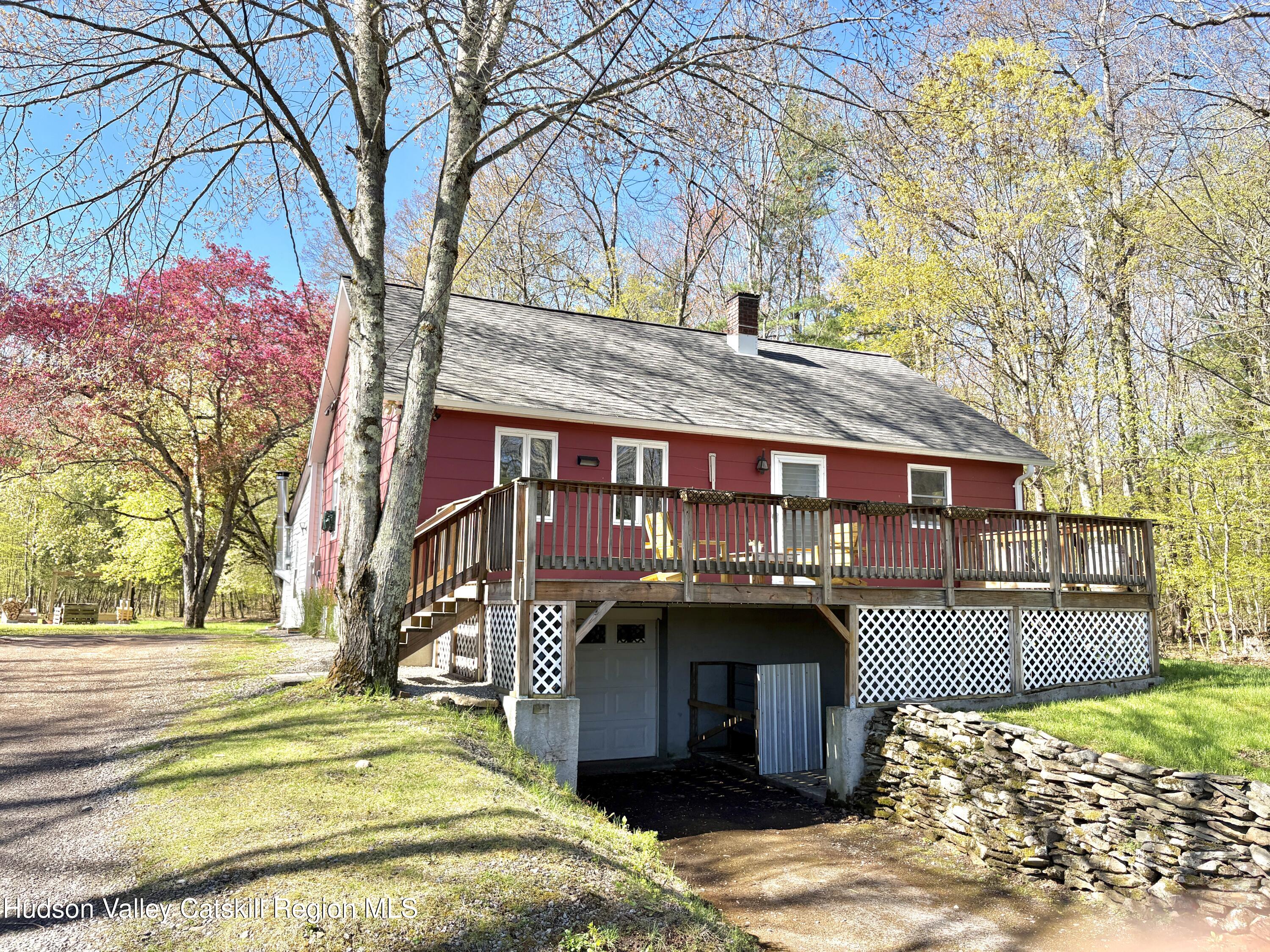 81 Mountain Turnpike Road Catskill, NY 12414 - Photo 1 of 36 a front view of a house with a yard