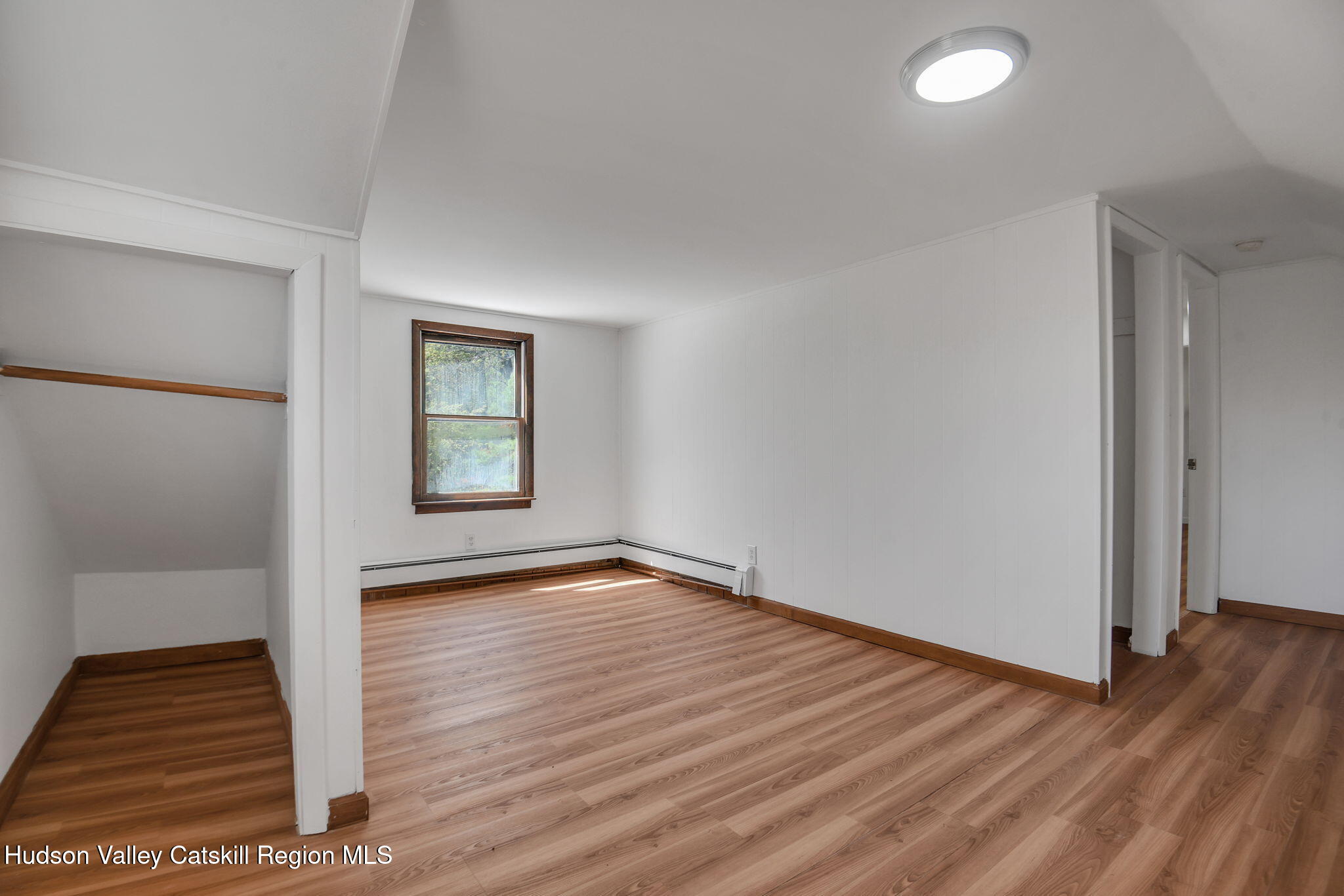 81 Mountain Turnpike Road Catskill, NY 12414 - Photo 20 of 36 wooden floor in an empty room with a window