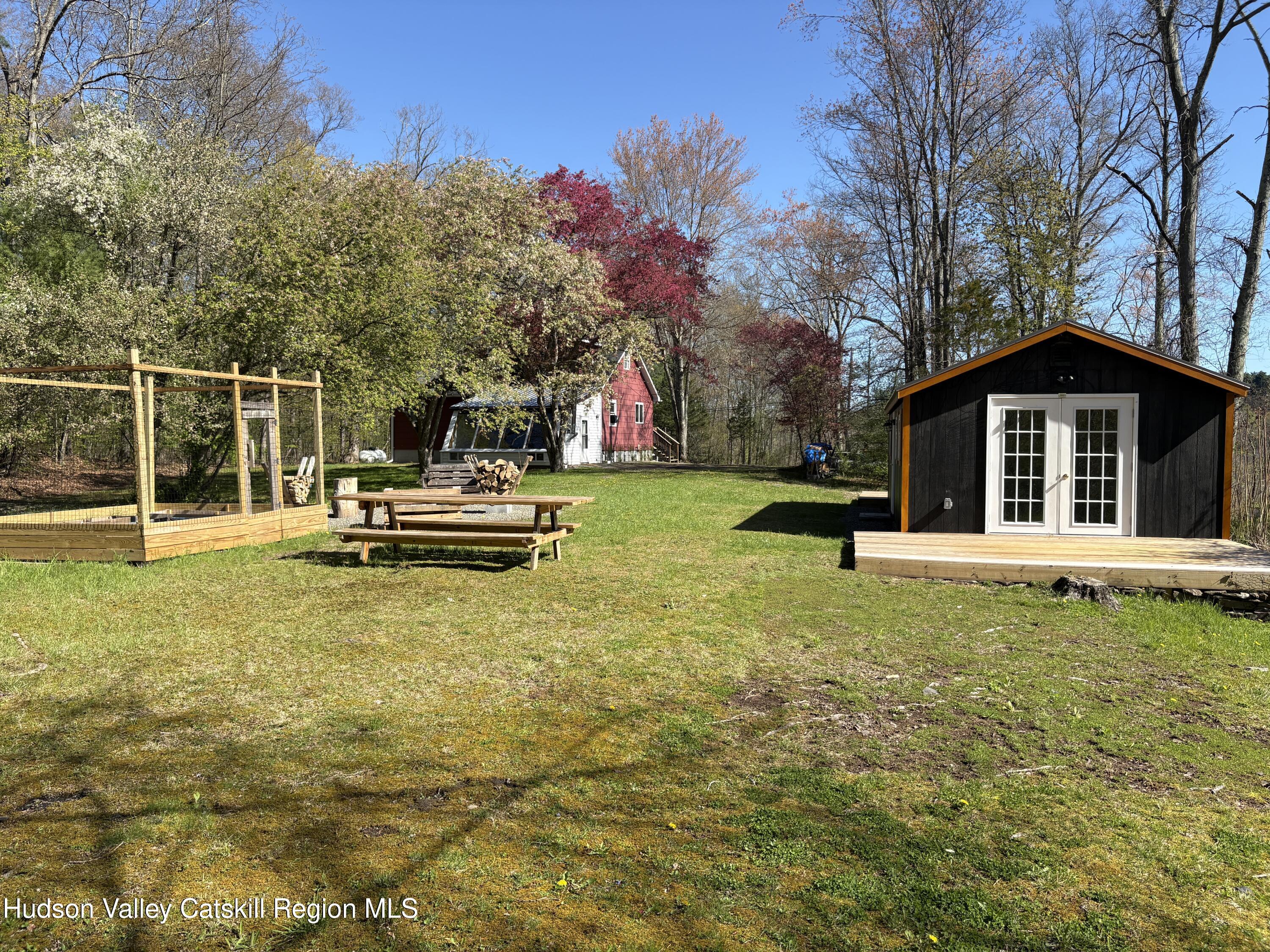 81 Mountain Turnpike Road Catskill, NY 12414 - Photo 35 of 36 a view of a house with swimming pool and sitting area