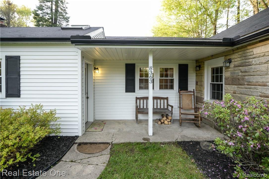 8363 McClements Road Brighton, MI 48114 - Photo 11 of 38 Enjoy sitting on your front porch