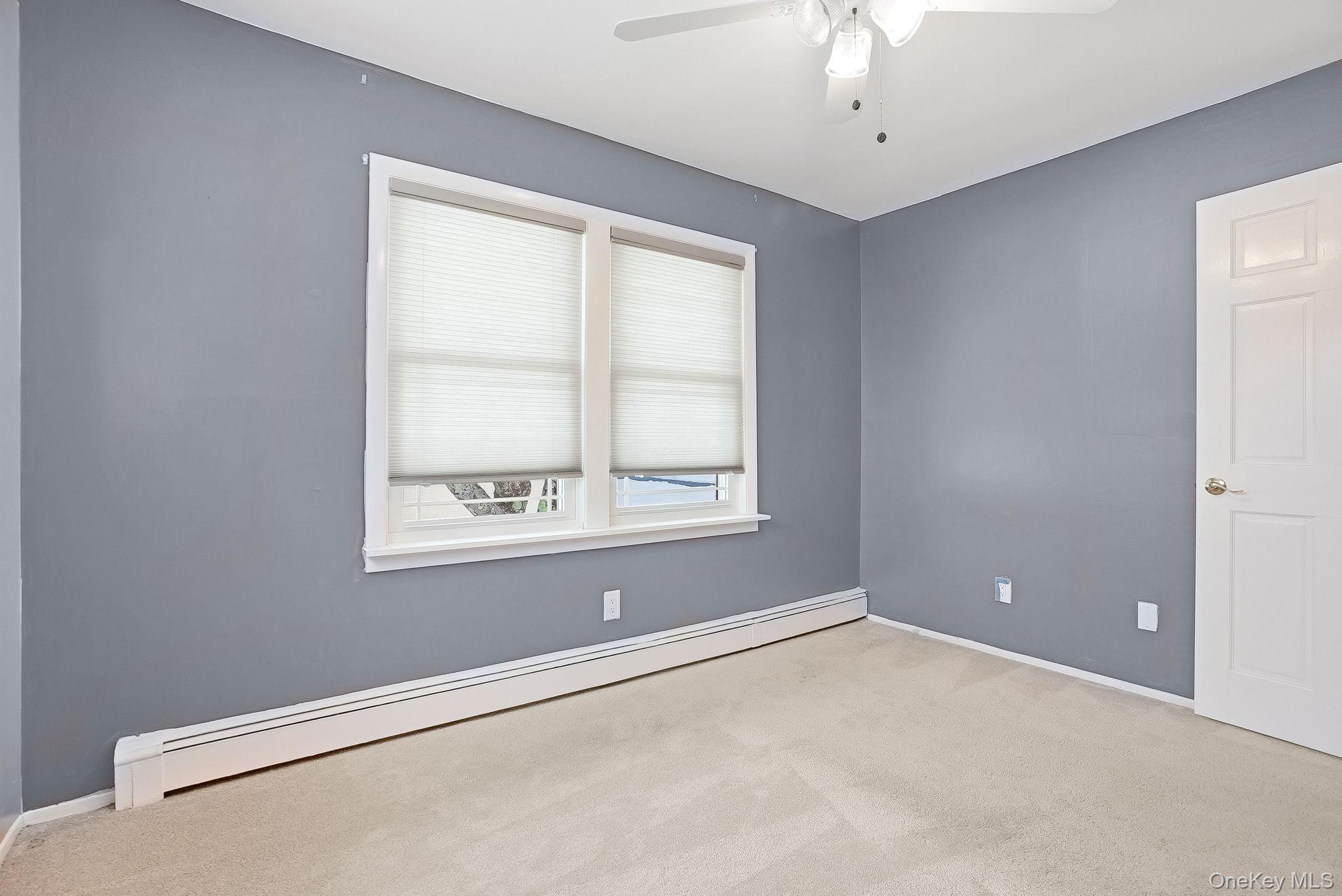12 Lakeview Road Carmel, NY 10512 - Photo 15 of 31 a view of an empty room with a window