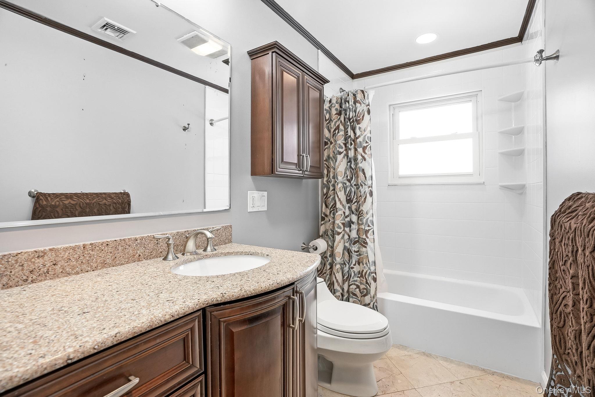 12 Lakeview Road Carmel, NY 10512 - Photo 17 of 31 a bathroom with a granite countertop sink toilet and shower