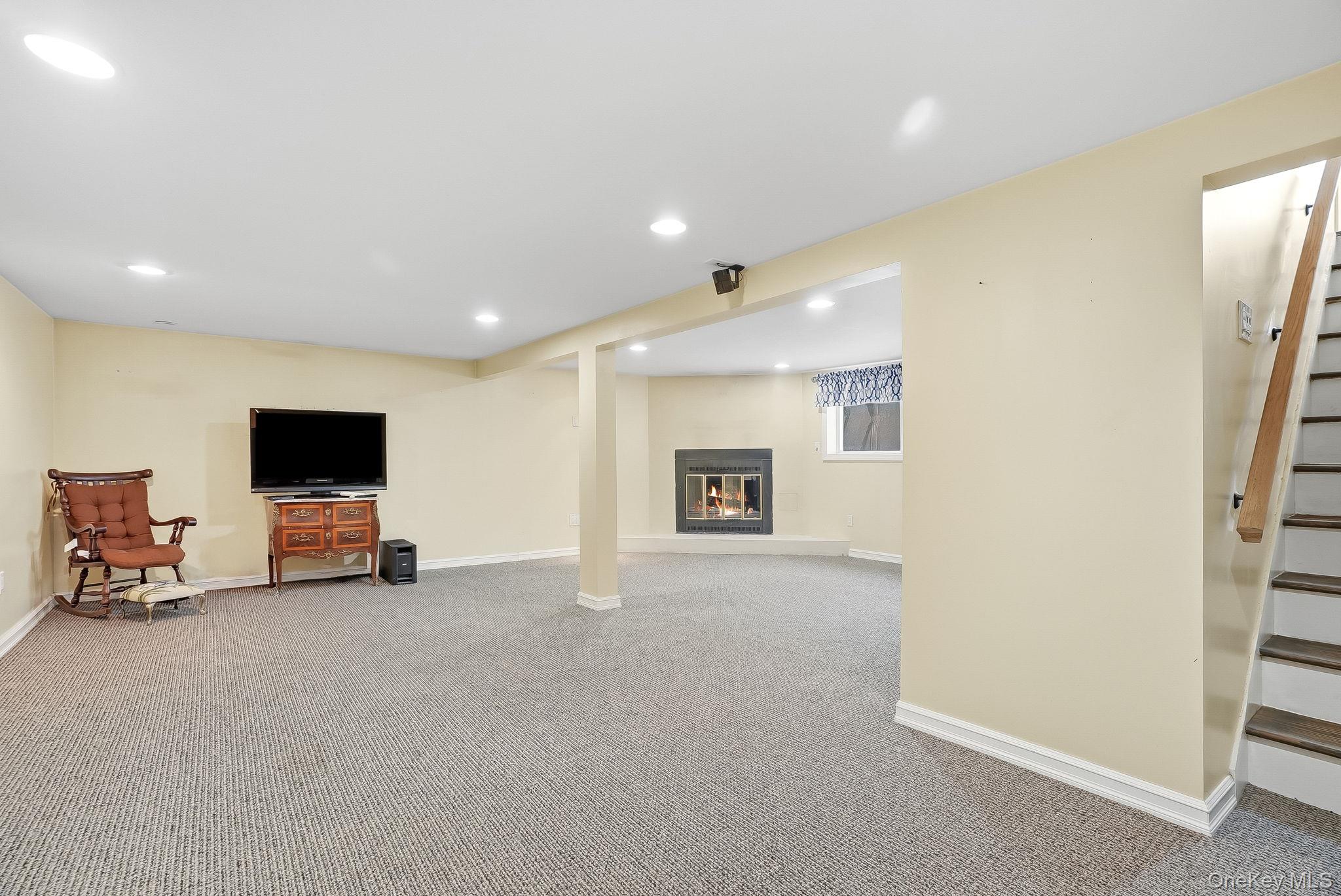 12 Lakeview Road Carmel, NY 10512 - Photo 18 of 31 a view of a livingroom with furniture and a fireplace