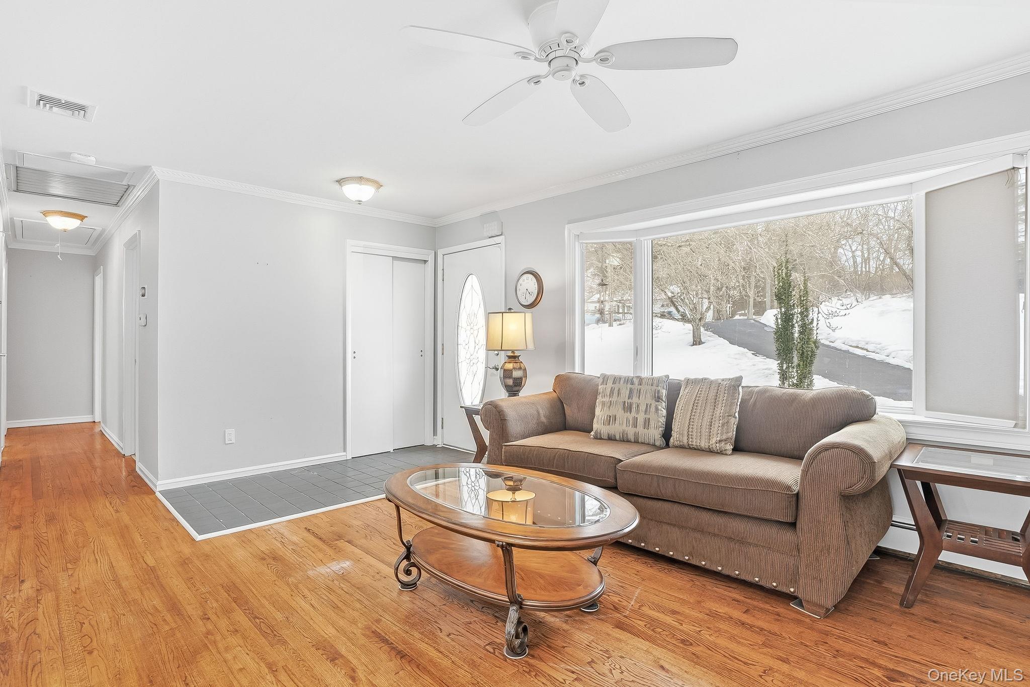 12 Lakeview Road Carmel, NY 10512 - Photo 2 of 31 a living room with furniture and a large window