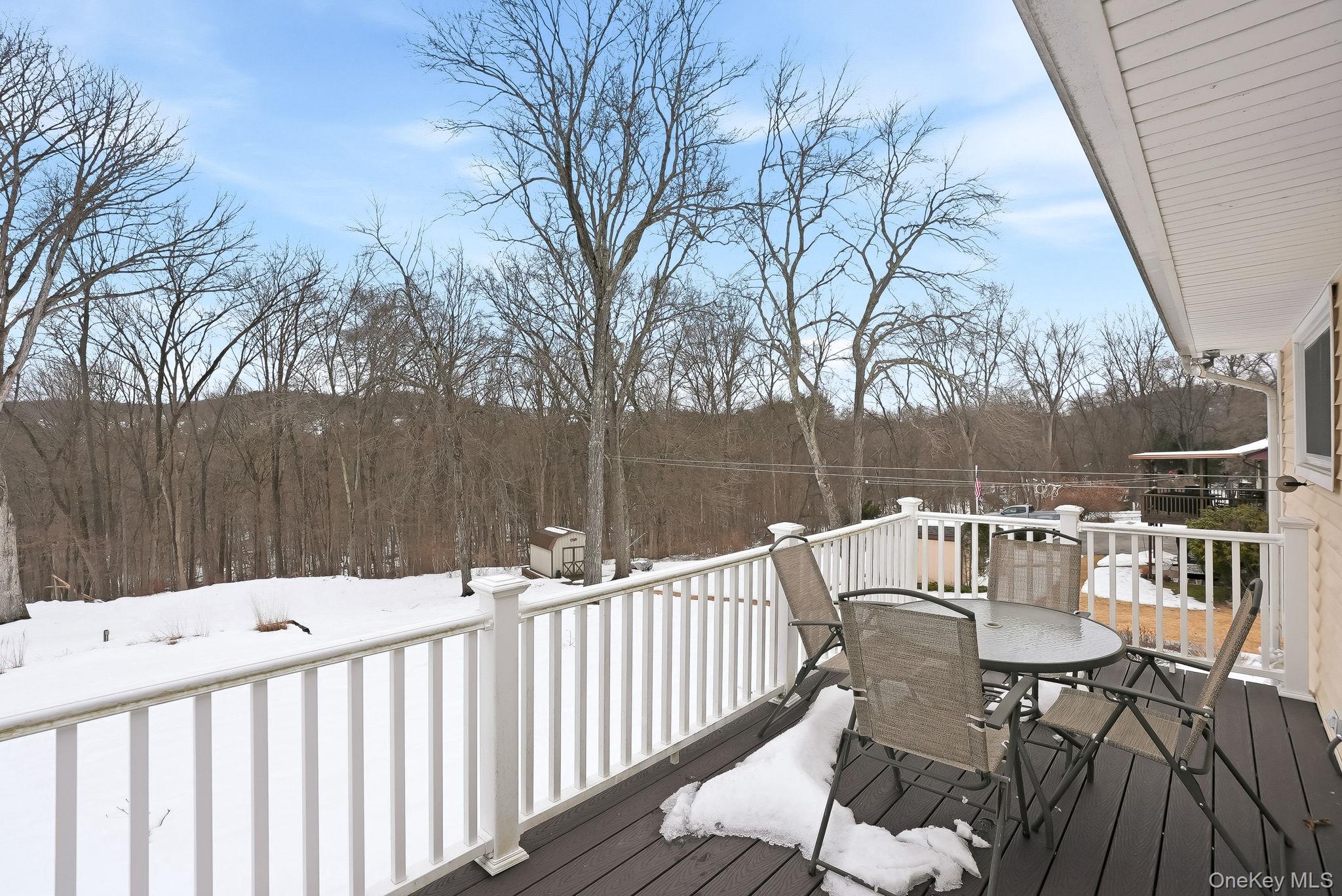 12 Lakeview Road Carmel, NY 10512 - Photo 23 of 31 a view of balcony with wooden floor and outdoor seating