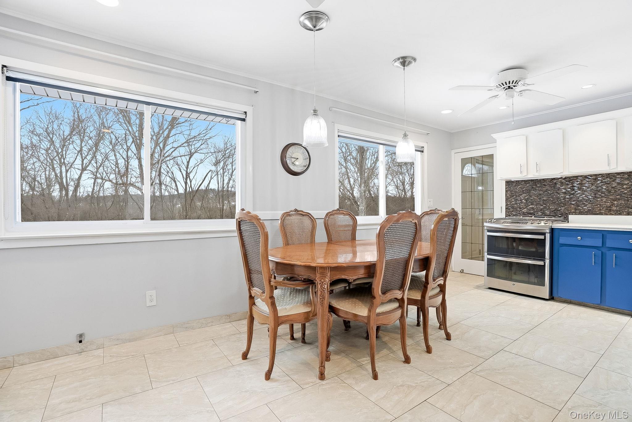 12 Lakeview Road Carmel, NY 10512 - Photo 7 of 31 a view of a dining room with furniture and a large window