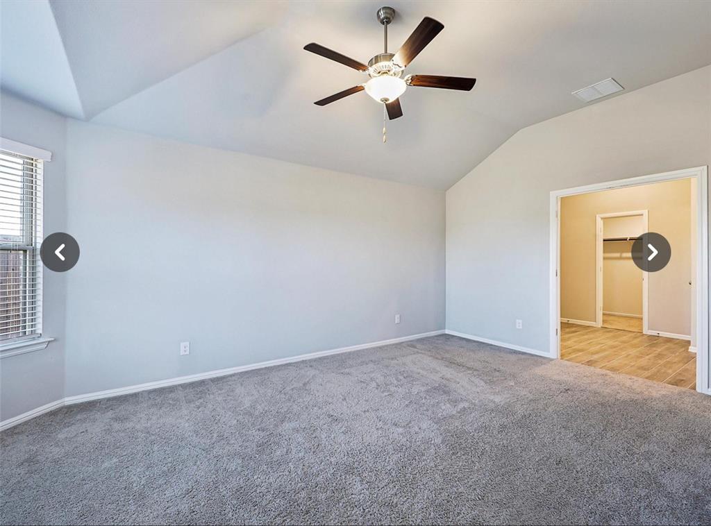 14219 Aberavon Drive Pilot Point, TX 76258 - Photo 13 of 25 an empty room with closet and windows