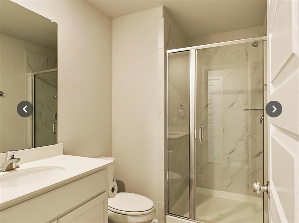 14219 Aberavon Drive Pilot Point, TX 76258 - Photo 20 of 25 a bathroom with a sink a toilet and shower